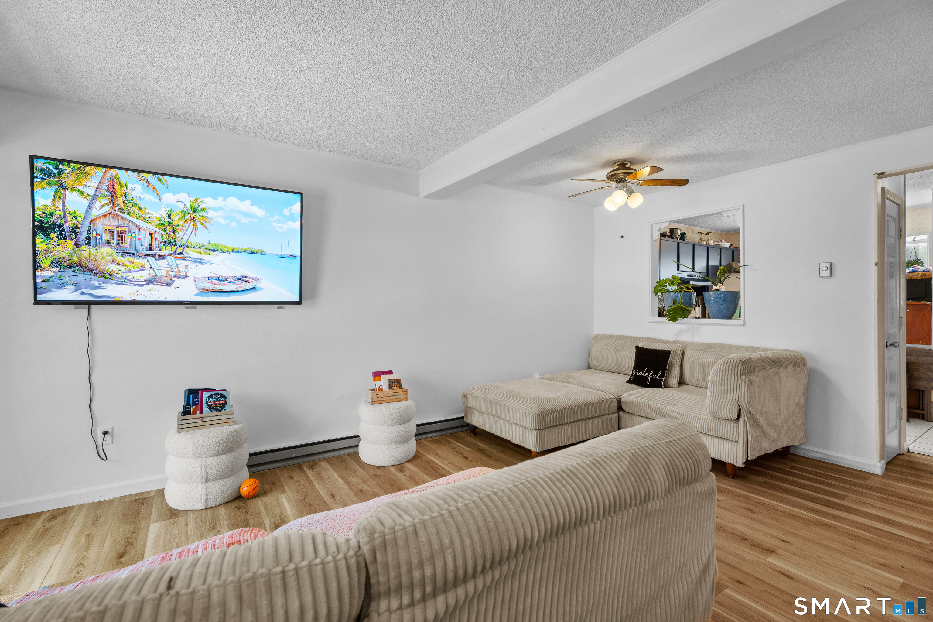 23 Pearl Lake Road, Unit B Waterbury, CT 06706 - Photo 3 of 14 a living room with furniture and wooden floor