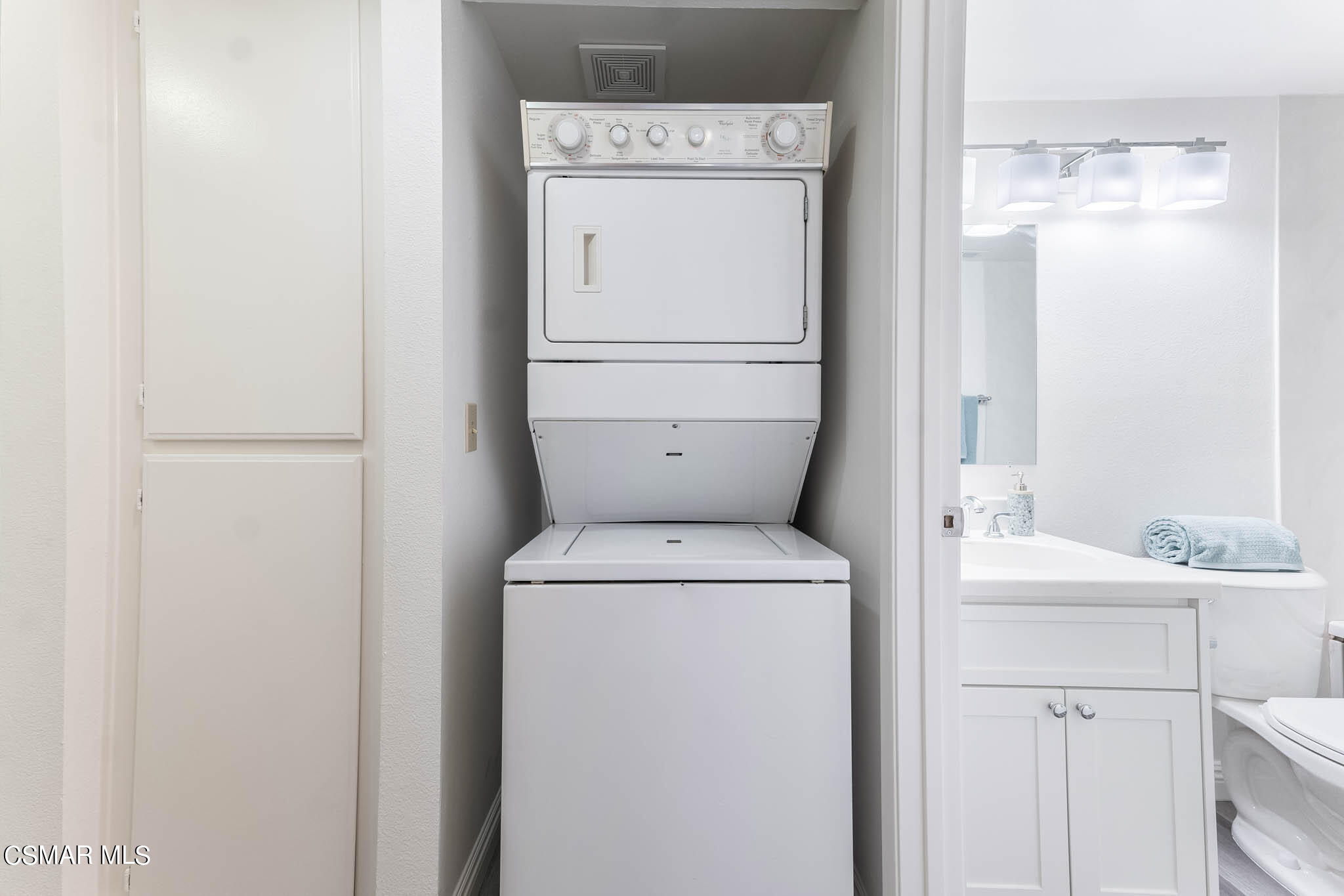 2731 Erringer Road, Unit 54 Simi Valley, CA 93065 - Photo 14 of 34 a utility room with dryer and washer