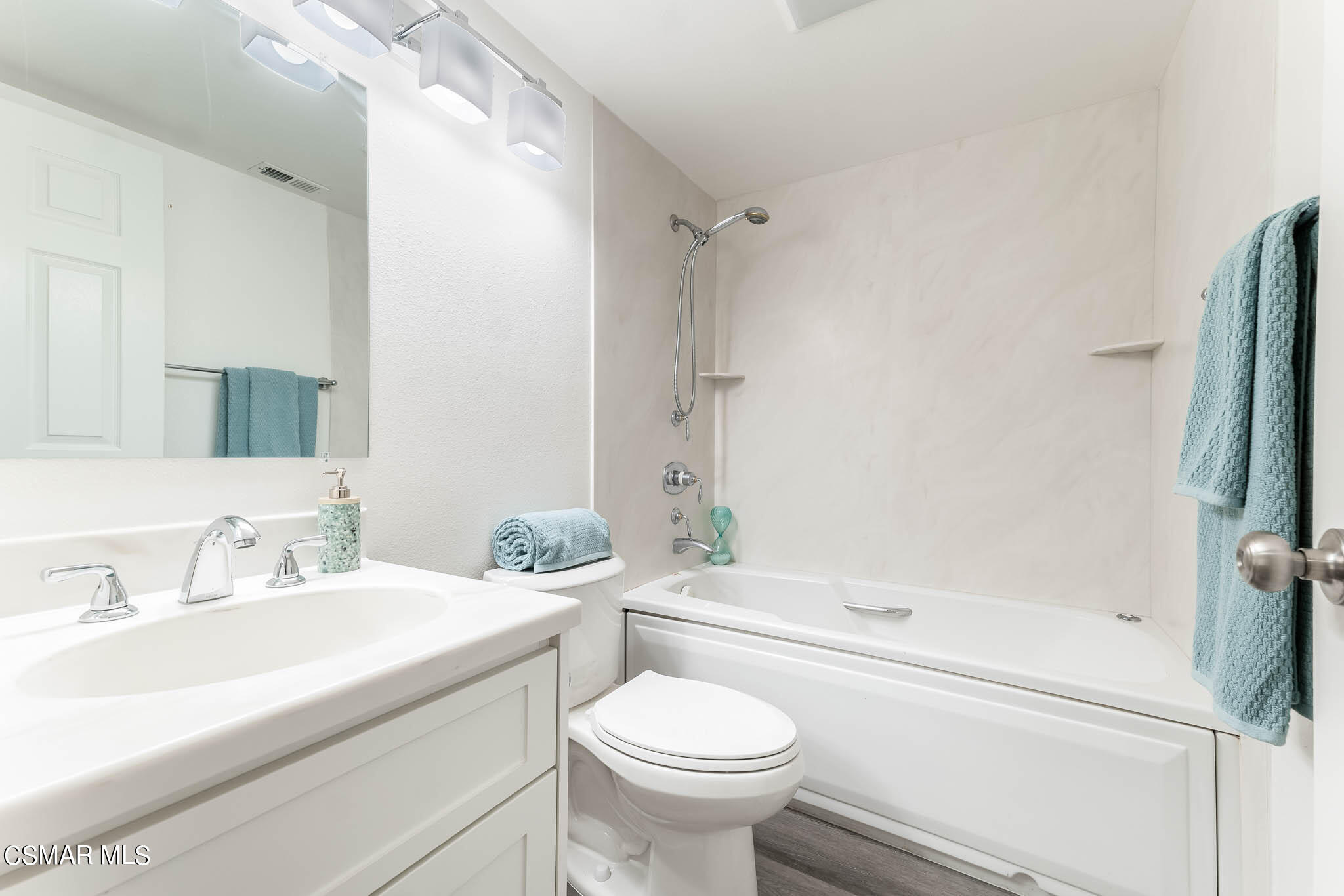 2731 Erringer Road, Unit 54 Simi Valley, CA 93065 - Photo 15 of 34 a bathroom with a sink toilet and shower