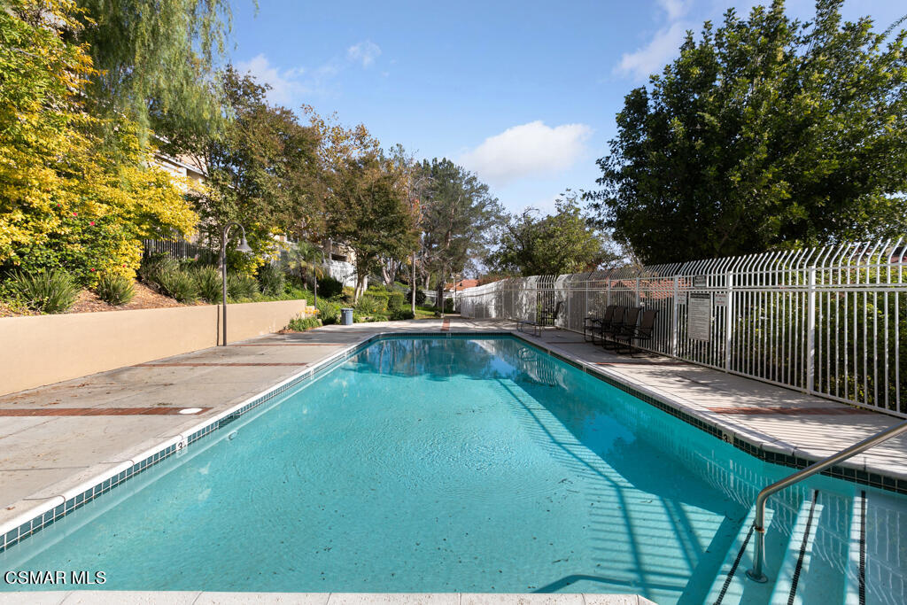 2731 Erringer Road, Unit 54 Simi Valley, CA 93065 - Photo 23 of 34 a view of swimming pool from a balcony