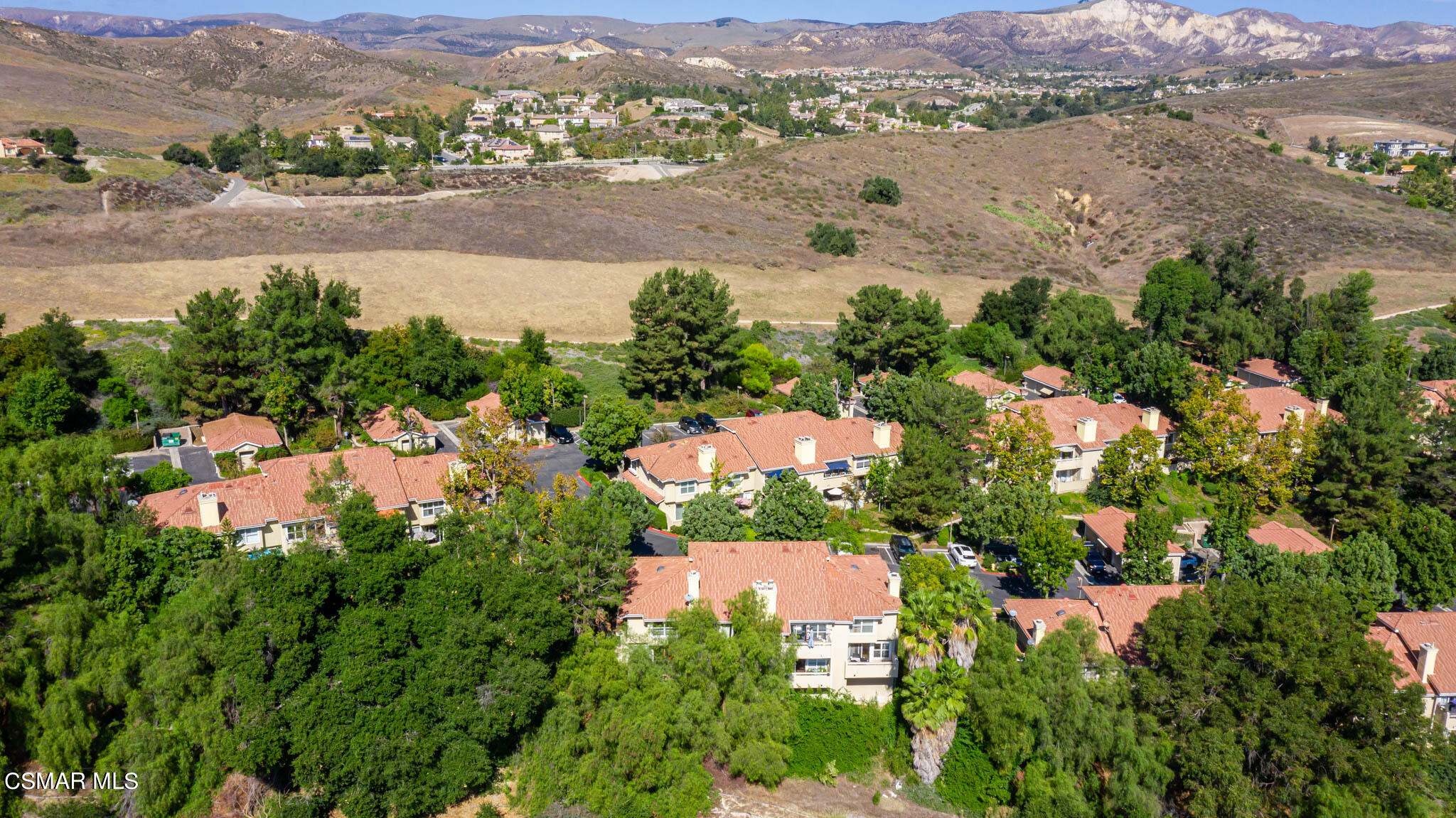 2731 Erringer Road, Unit 54 Simi Valley, CA 93065 - Photo 28 of 34 an aerial view of residential houses with outdoor space and street view