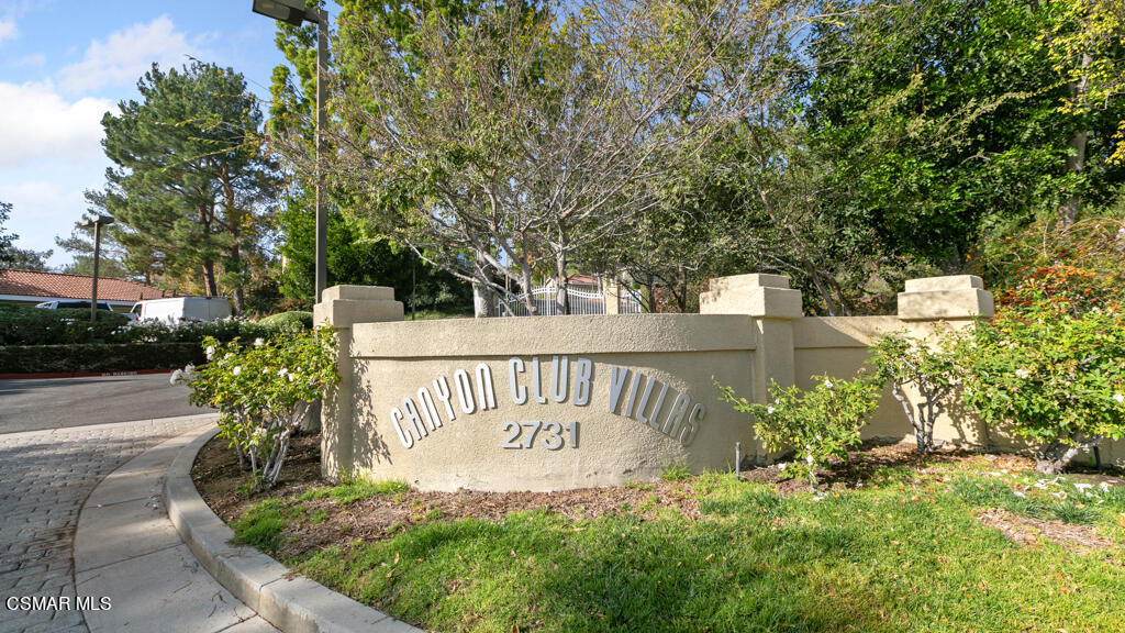 2731 Erringer Road, Unit 54 Simi Valley, CA 93065 - Photo 34 of 34 a view of a bench in a garden
