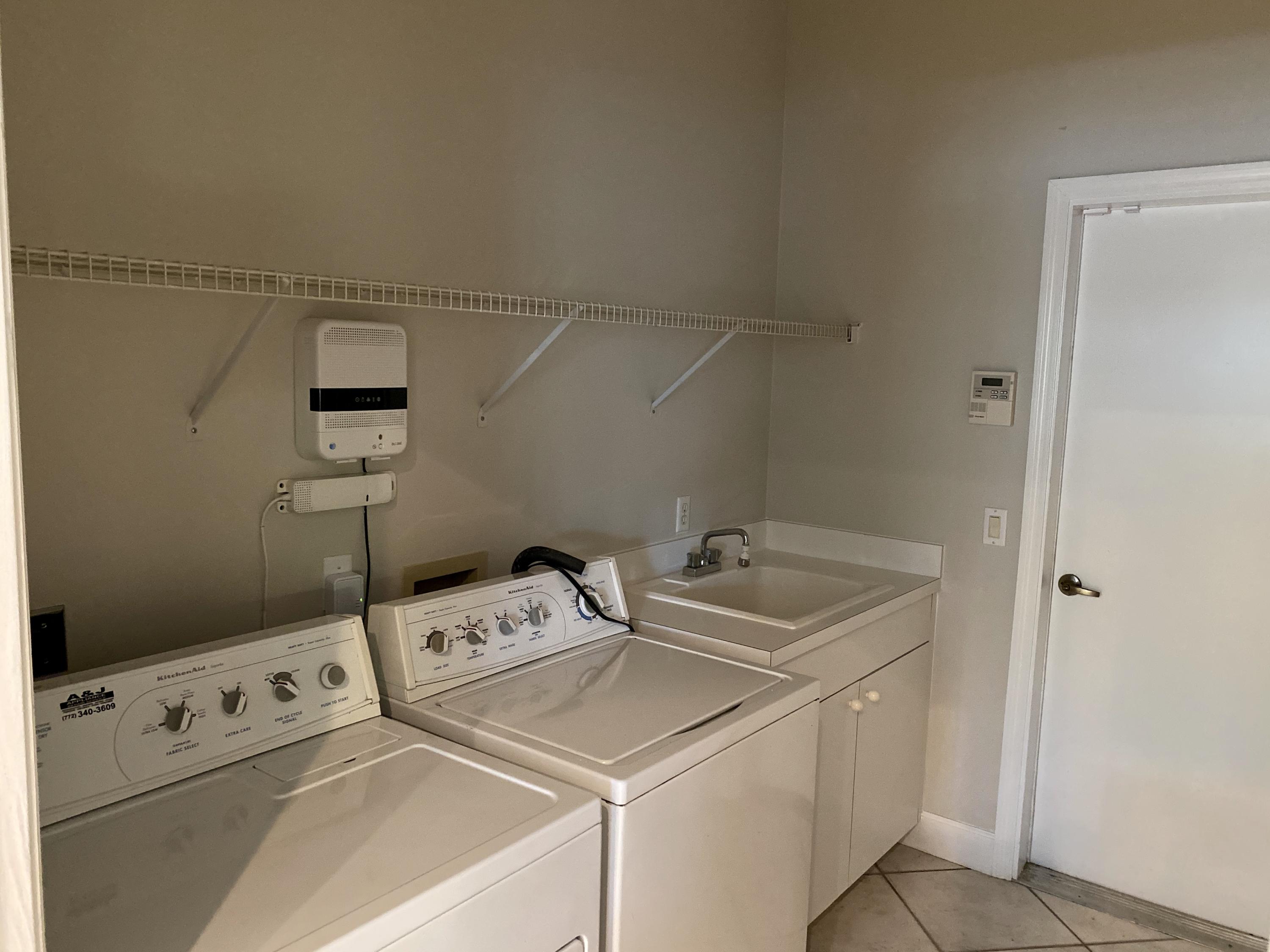 2720 Southeast Kern Road Port St. Lucie, FL 34984 - Photo 16 of 54 Utility Room