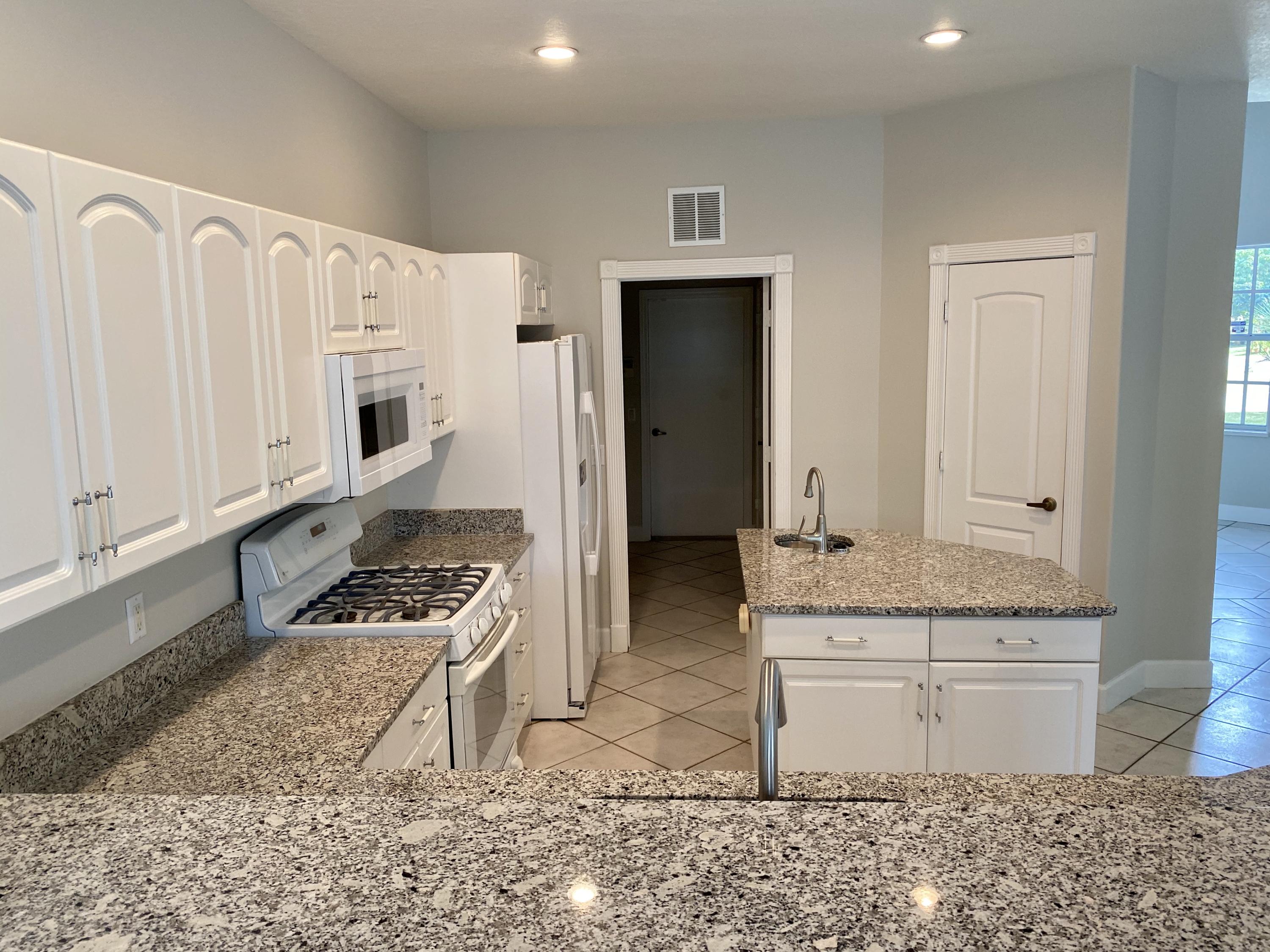 2720 Southeast Kern Road Port St. Lucie, FL 34984 - Photo 8 of 54 Sparkling Kitchen
