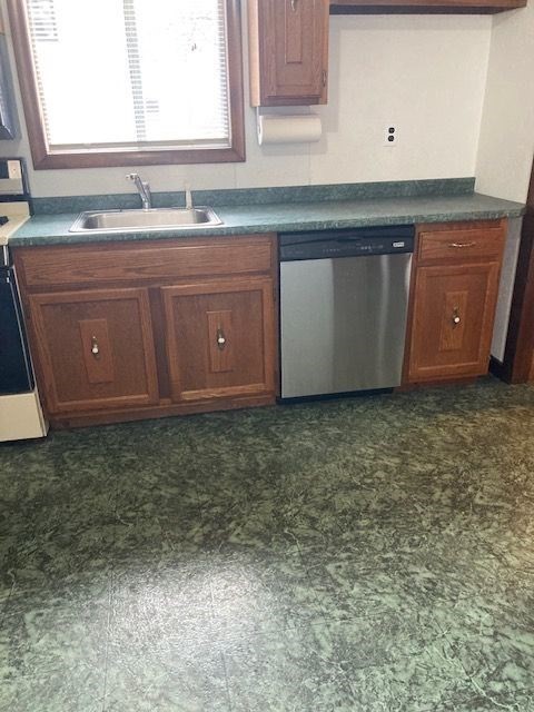 90 Prospect Street, Unit 2 Somerville, MA 02143 - Photo 13 of 27 a bathroom with a sink and a mirror