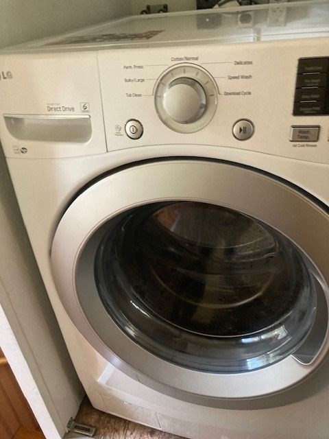 90 Prospect Street, Unit 2 Somerville, MA 02143 - Photo 21 of 27 a close up view of washer and dryer