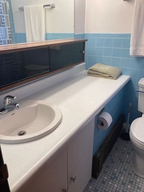 90 Prospect Street, Unit 2 Somerville, MA 02143 - Photo 22 of 27 a bathroom with a sink and toilet