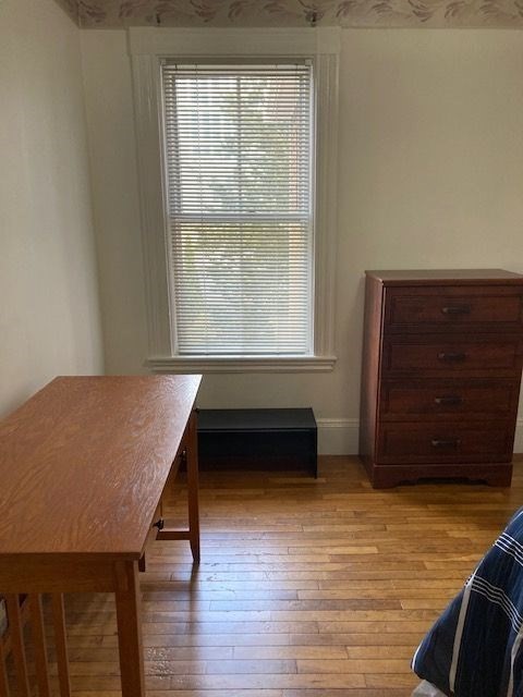90 Prospect Street, Unit 2 Somerville, MA 02143 - Photo 10 of 27 a living room with a dresser