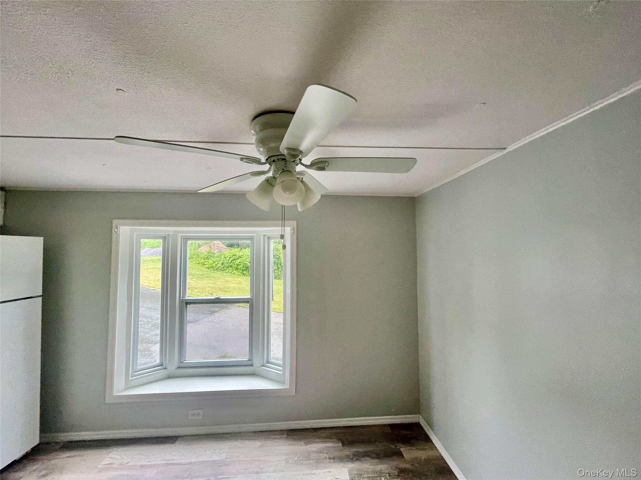95 New Hackensack Road, Unit 45 Wappingers Falls, NY 12590 - Photo 5 of 17 Kitchen Bay Window and Ceiling Fan