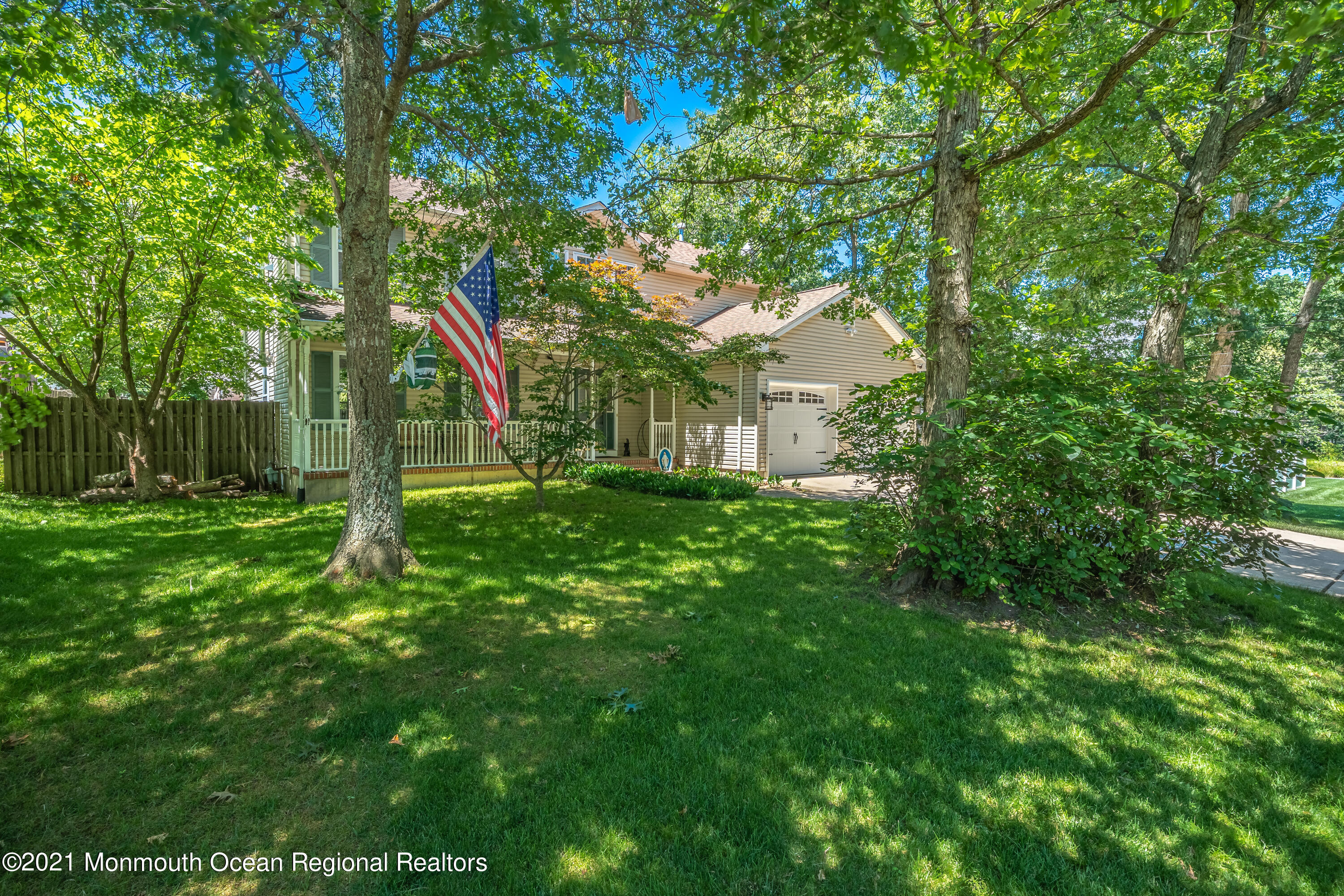 217 Topside Road Manahawkin, NJ 08050 - Photo 1 of 35 a view of a house with a tree and a yard