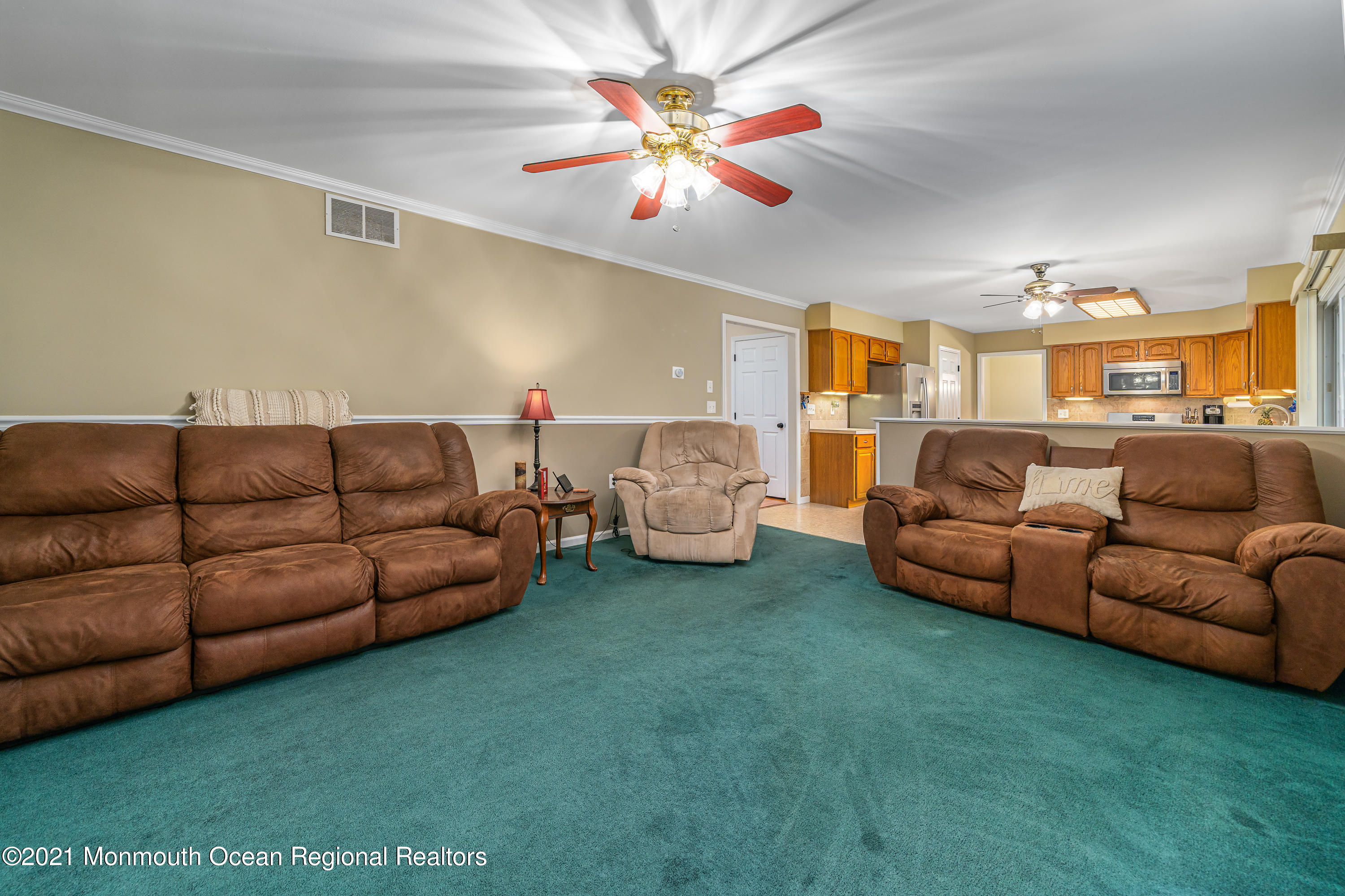 217 Topside Road Manahawkin, NJ 08050 - Photo 16 of 35 a living room with furniture and fireplace