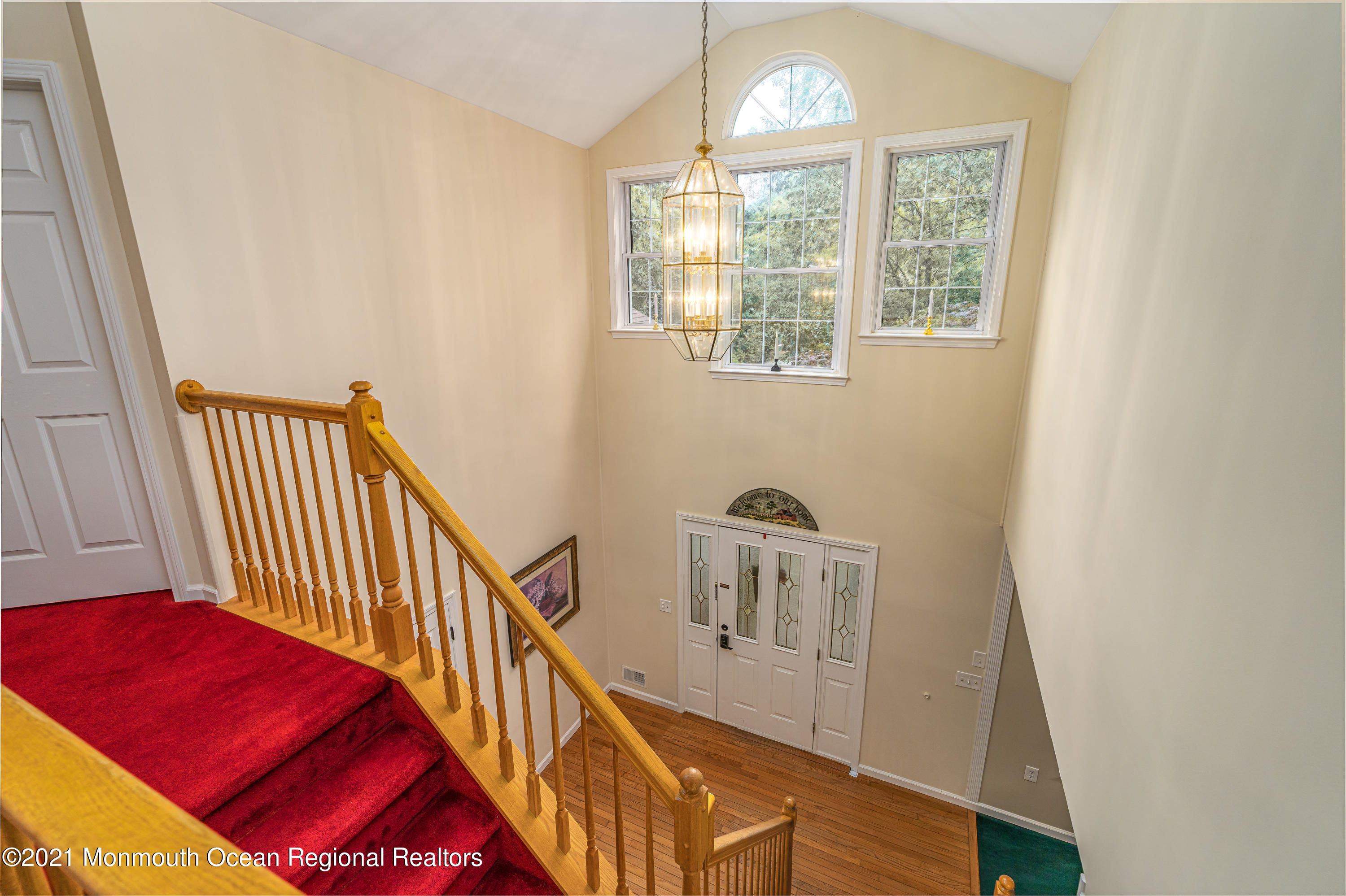 217 Topside Road Manahawkin, NJ 08050 - Photo 18 of 35 a view of a hallway with windows