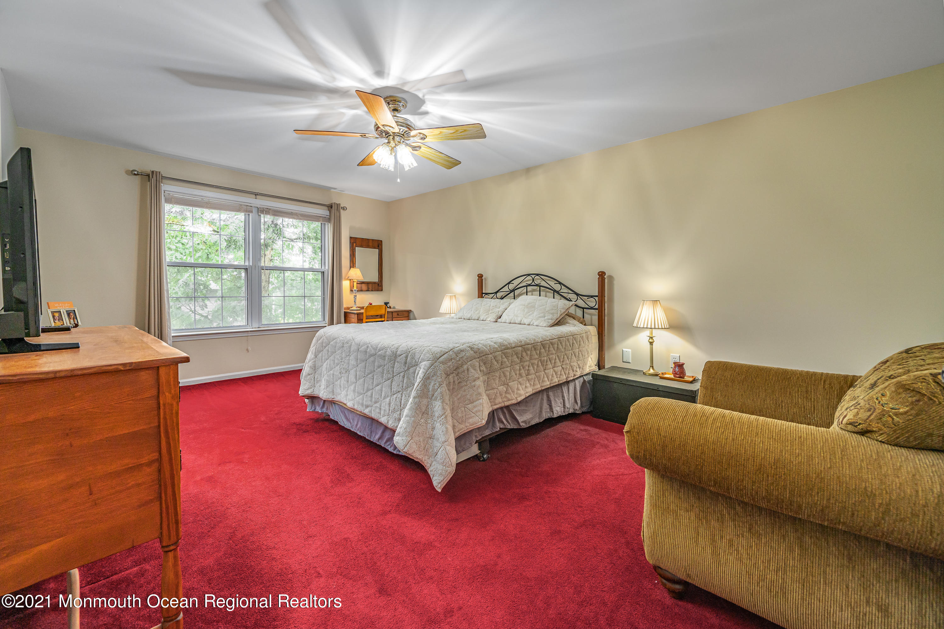 217 Topside Road Manahawkin, NJ 08050 - Photo 24 of 35 a bedroom with a bed and a couch