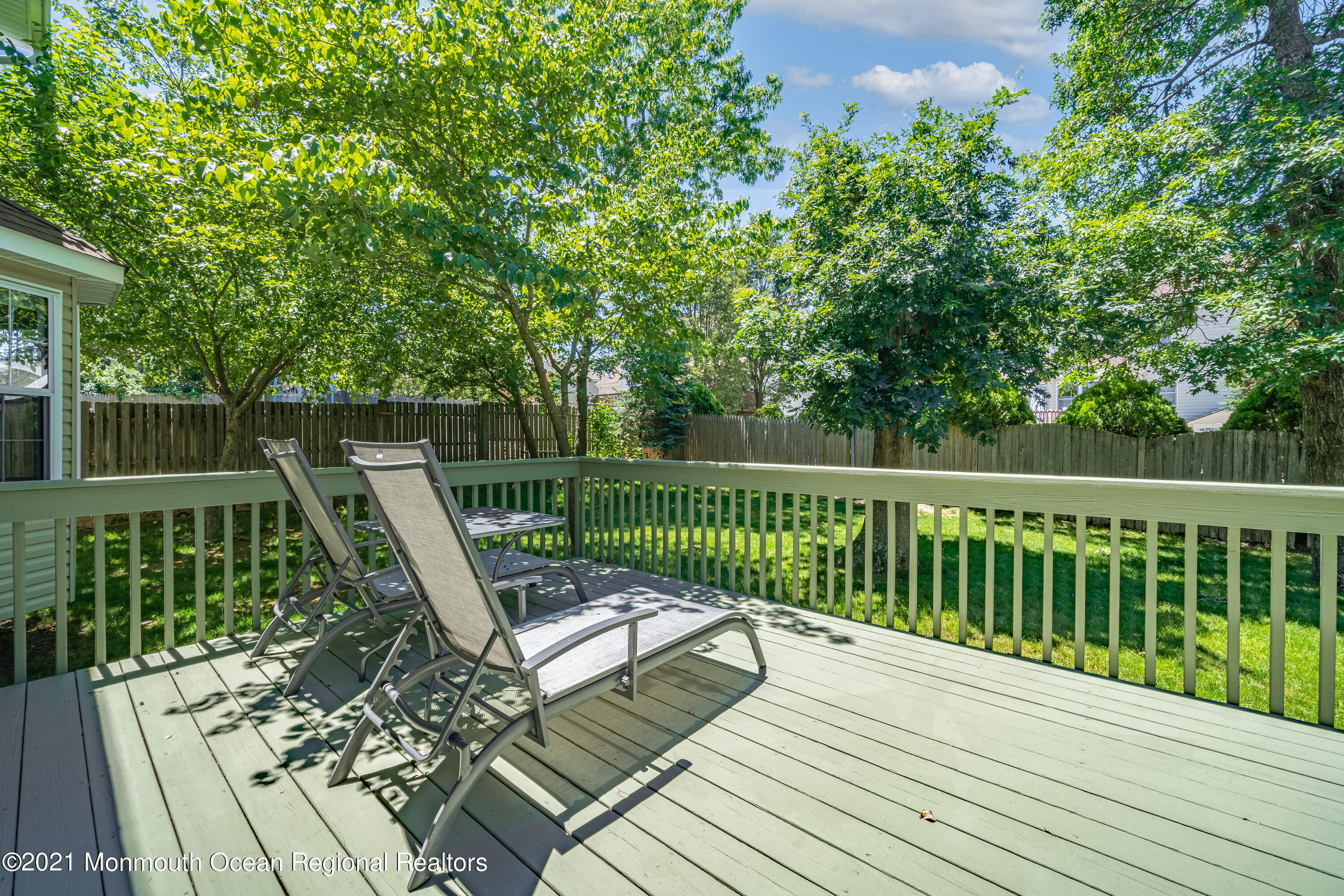 217 Topside Road Manahawkin, NJ 08050 - Photo 25 of 35 a view of balcony with wooden floor and fence