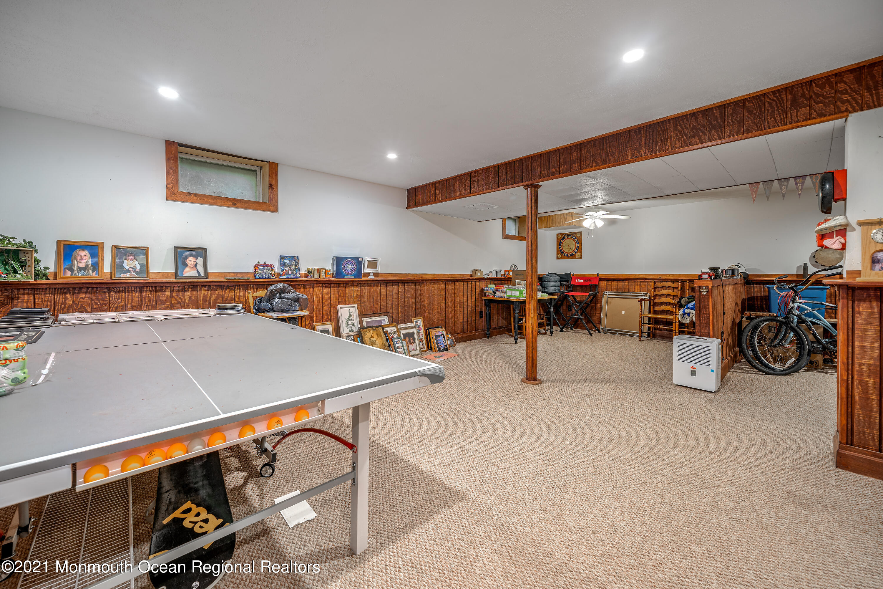 217 Topside Road Manahawkin, NJ 08050 - Photo 33 of 35 a room with furniture and a flat screen tv