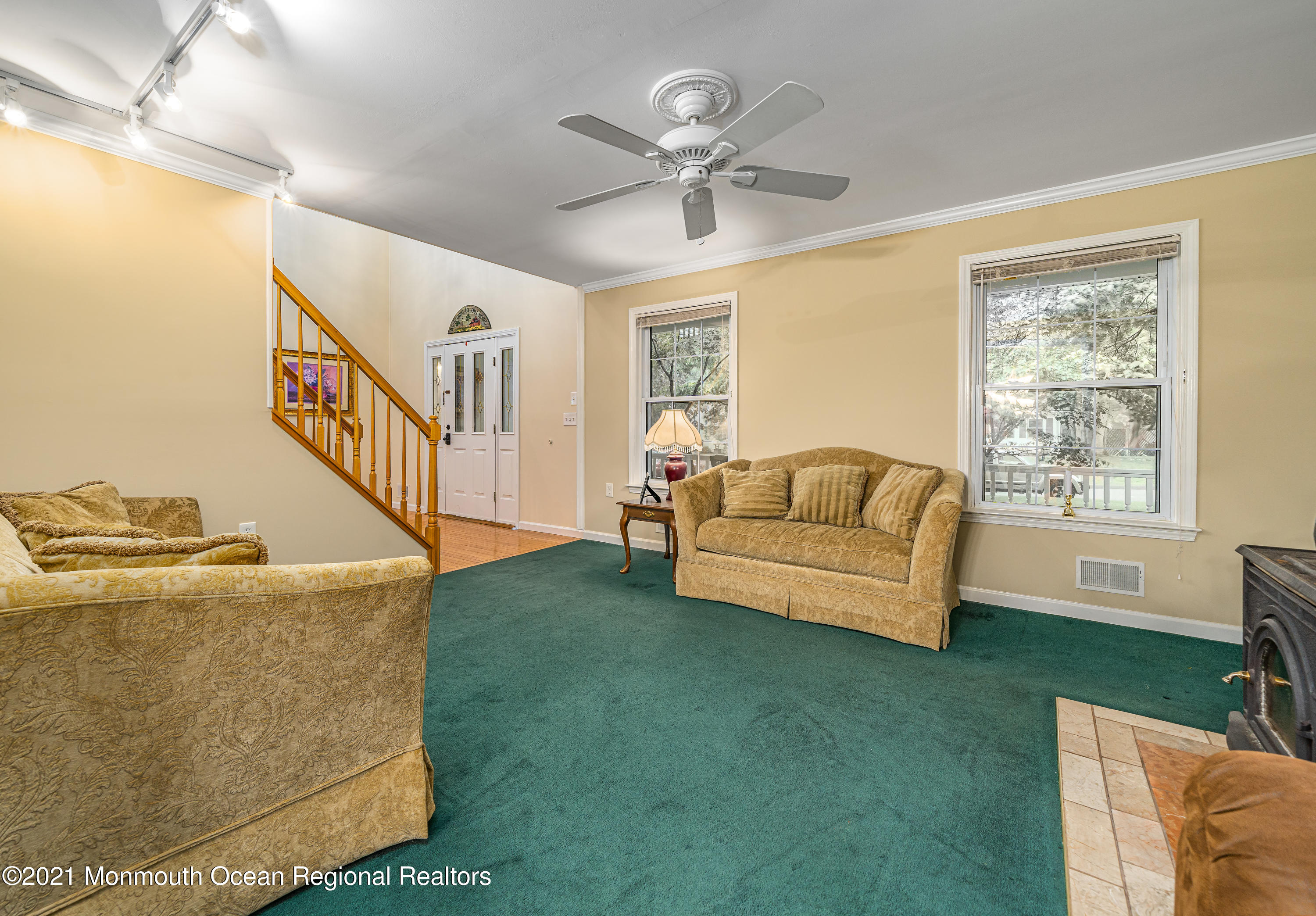 217 Topside Road Manahawkin, NJ 08050 - Photo 8 of 35 a living room with furniture and a large window