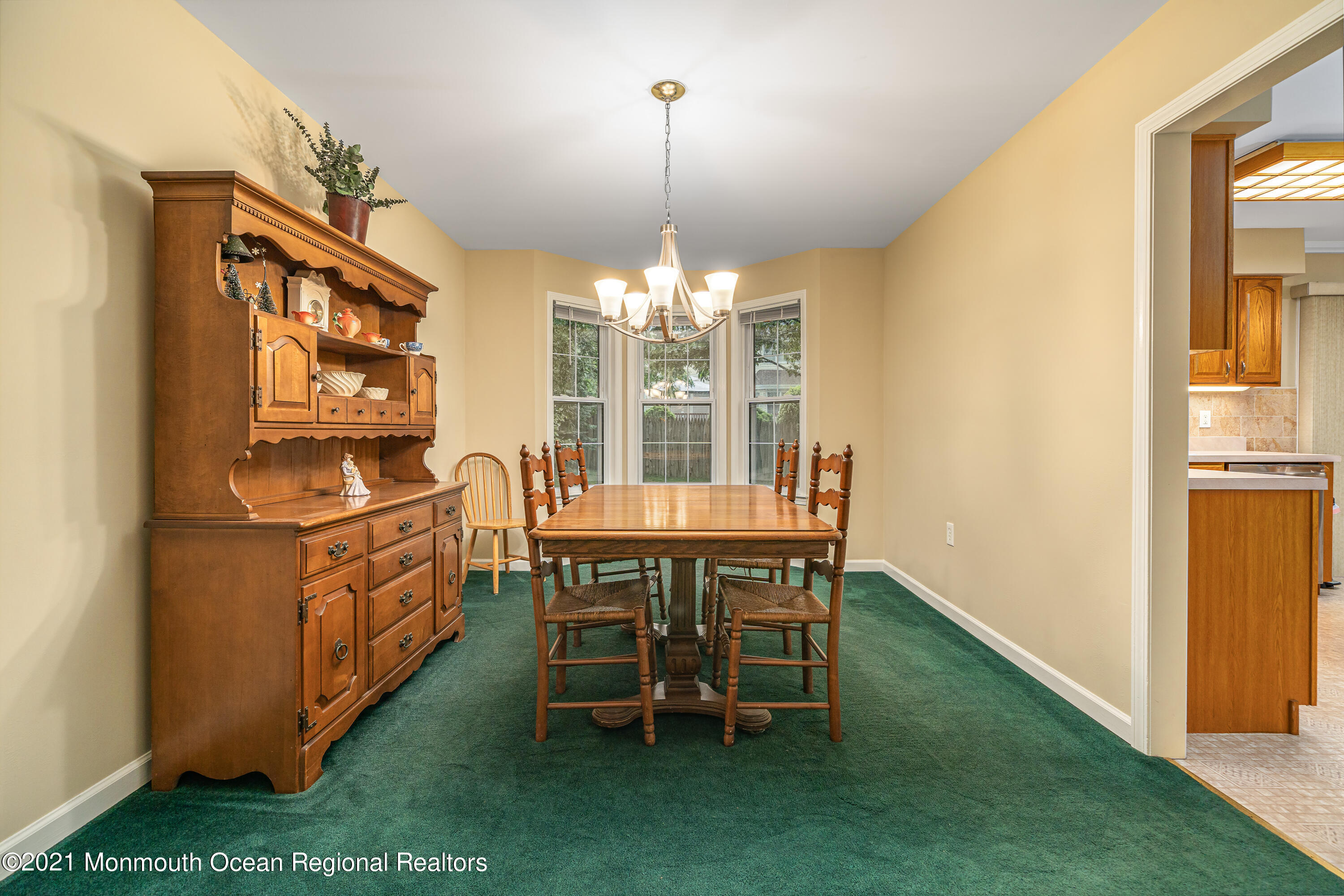 217 Topside Road Manahawkin, NJ 08050 - Photo 9 of 35 a view of a dining room with furniture window and outside view