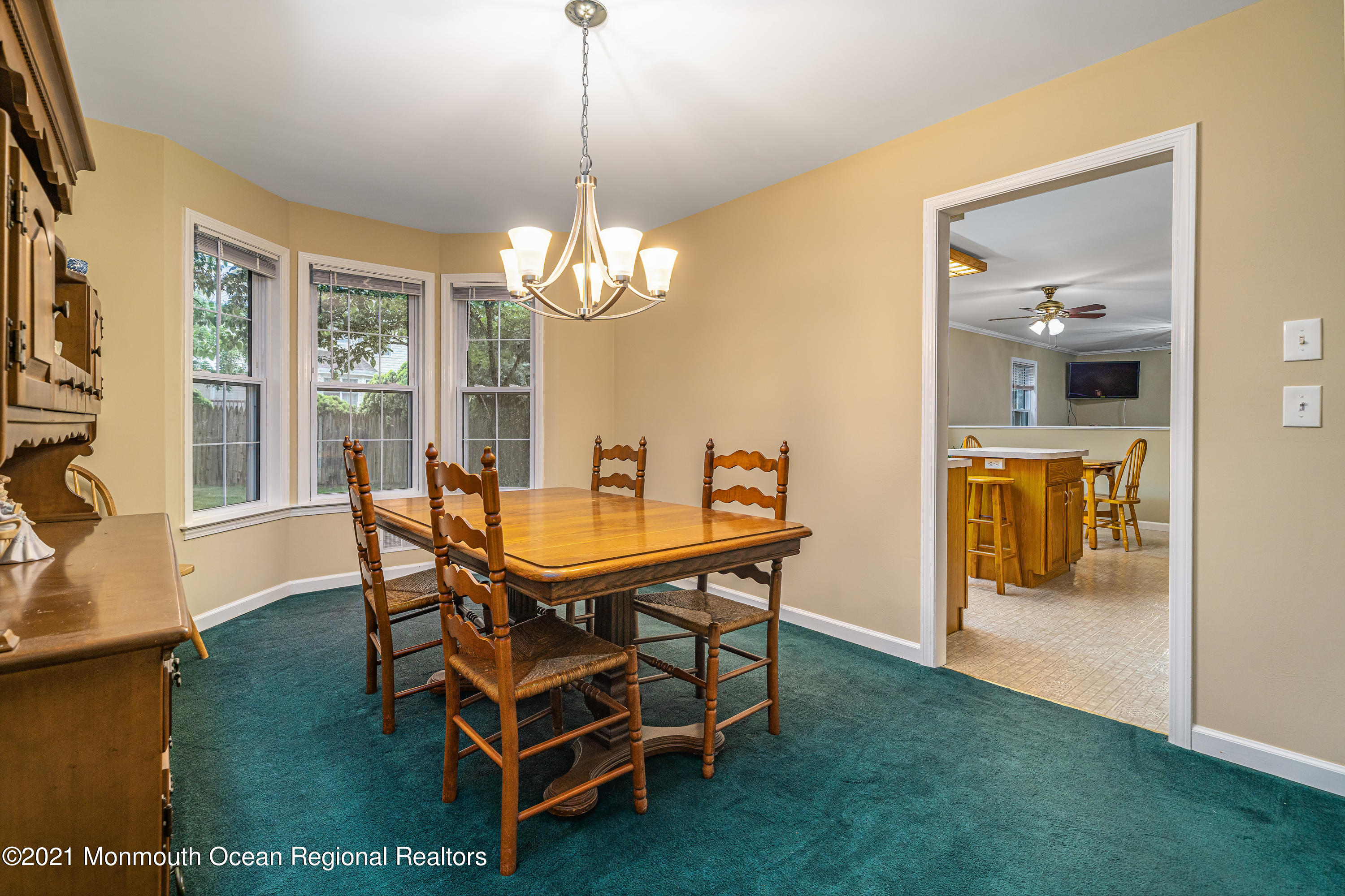 217 Topside Road Manahawkin, NJ 08050 - Photo 10 of 35 a view of a dining room with furniture and wooden floor