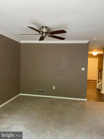 a kitchen with stainless steel appliances a sink a stove a microwave and cabinets