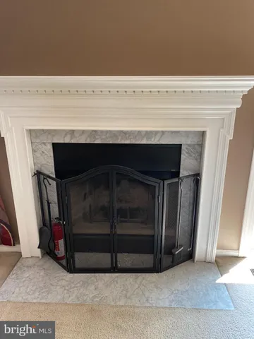 a kitchen with stainless steel appliances a refrigerator sink and microwave