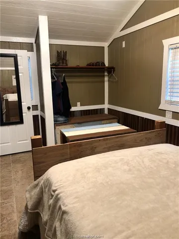 a view of bedroom and bathroom