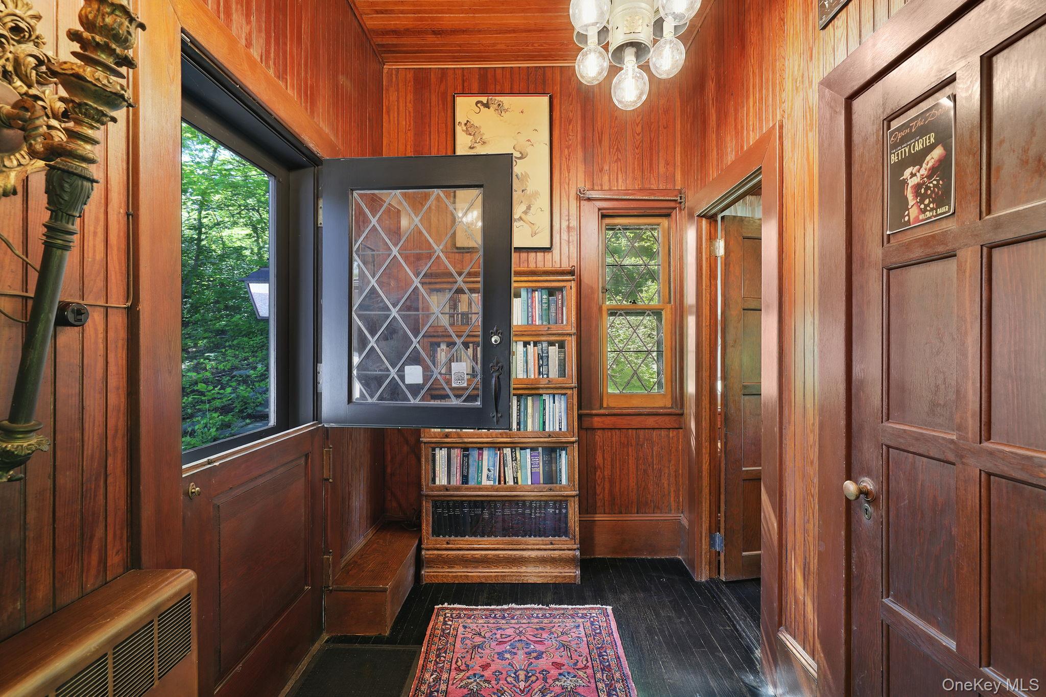 3 Holbrook Road Briarcliff Manor, NY 10510 - Photo 20 of 38 A separate side entry-way with wood paneling. Can be a separate area for in-laws, au-pair or work space