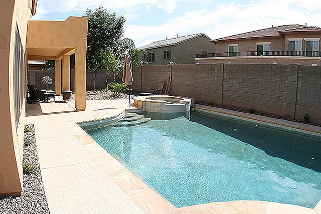 3044 South Martingale Road Gilbert, AZ 85295 - Photo 11 of 20 a view of a house with backyard and sitting area