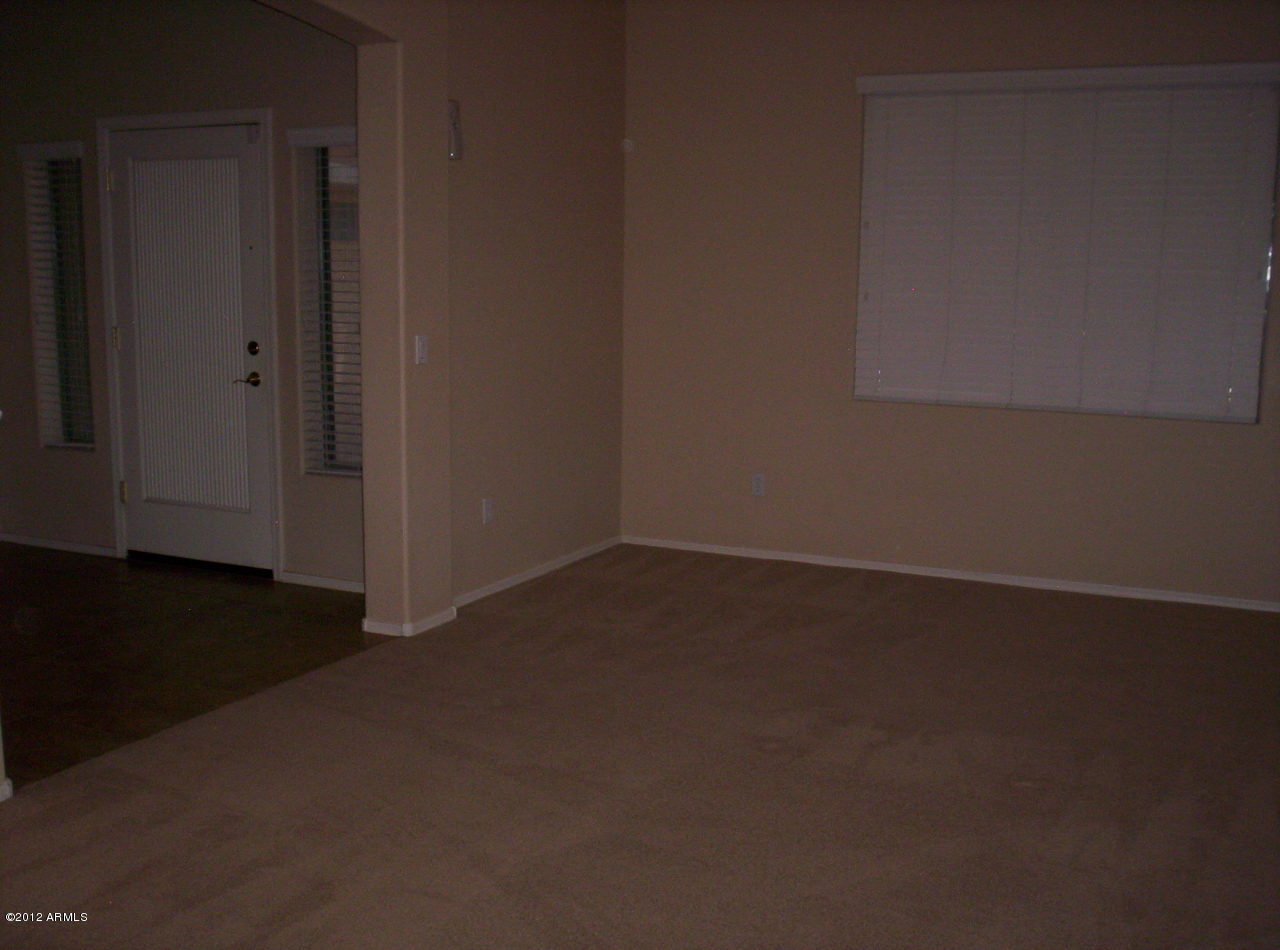 3044 South Martingale Road Gilbert, AZ 85295 - Photo 4 of 20 a view of small space with wooden floor