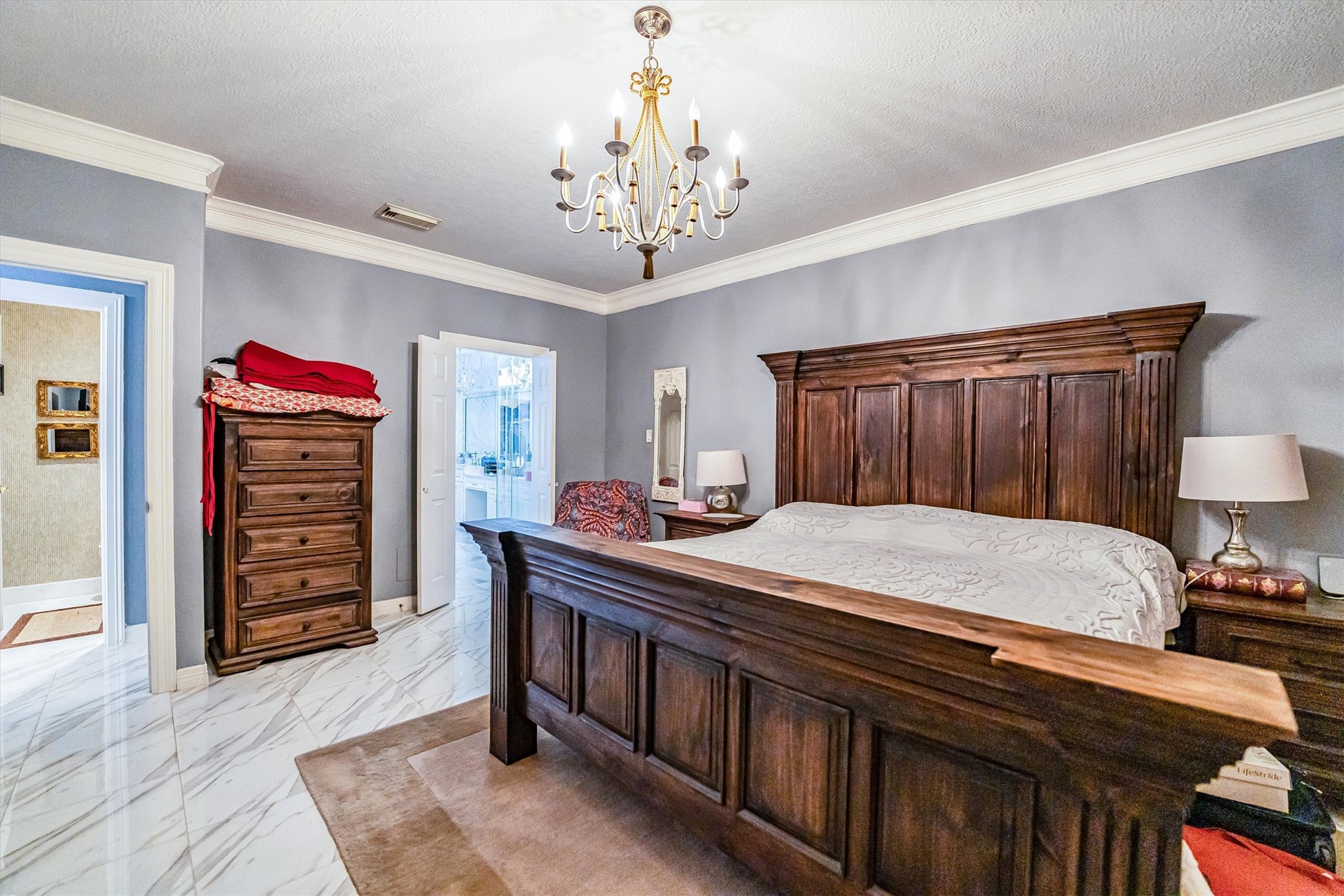 8002 Royal Crest Court Spring, TX 77379 - Photo 19 of 50 a bed room with a bed and a television