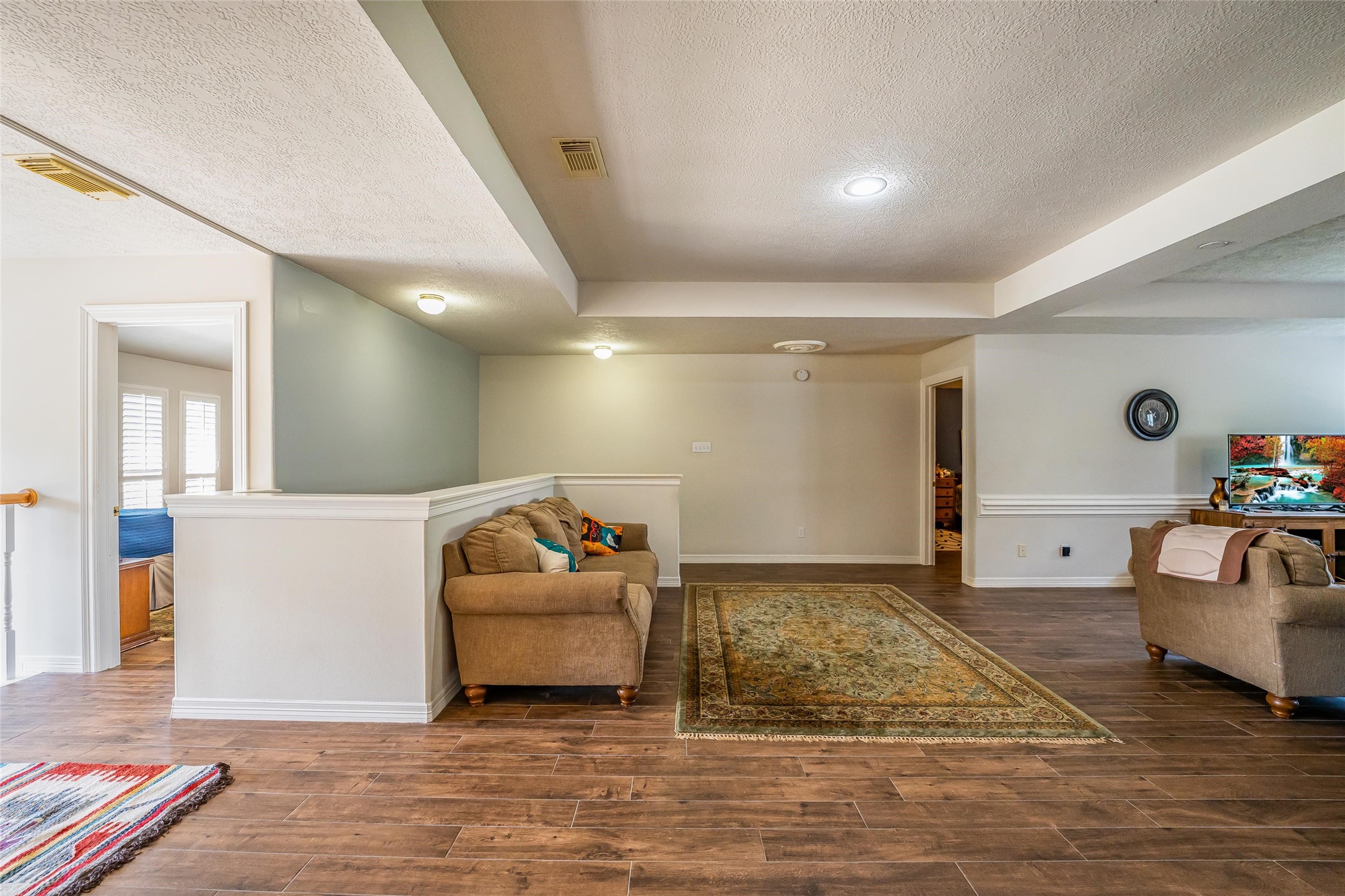 8002 Royal Crest Court Spring, TX 77379 - Photo 39 of 50 a living room with furniture and a couch