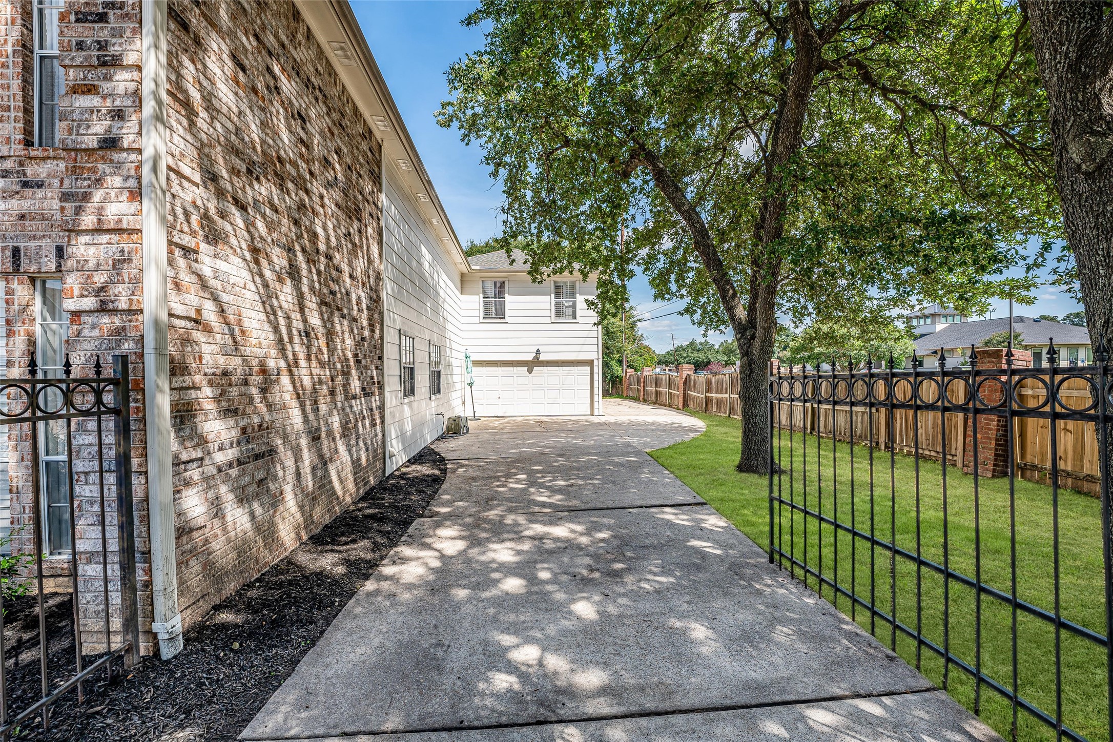 8002 Royal Crest Court Spring, TX 77379 - Photo 49 of 50 Drive leading to the 4-car tandem garage