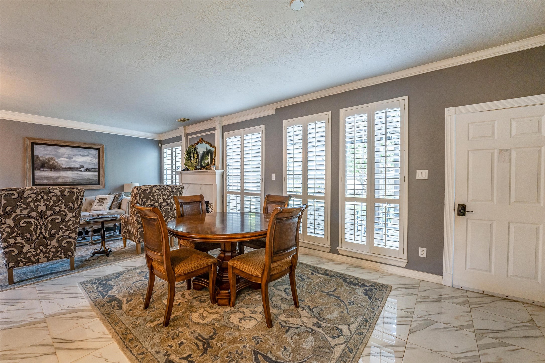 8002 Royal Crest Court Spring, TX 77379 - Photo 10 of 50 a view of a dining room with furniture and chandelier