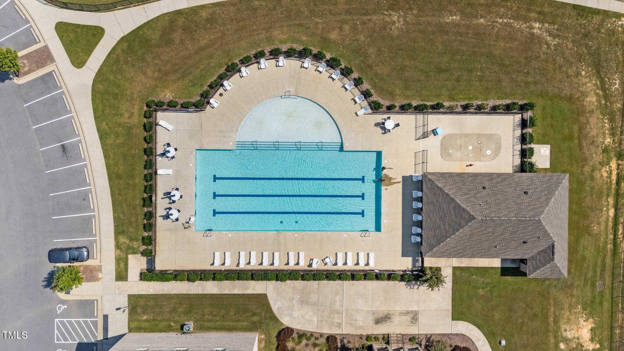 76 Commons Circle Clayton, NC 27520 - Photo 28 of 29 aerial view of a house with swimming pool