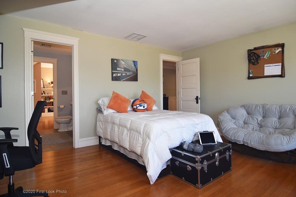 50 Cook Road Cumberland, RI 02864 - Photo 21 of 42 a bedroom with furniture and a couch