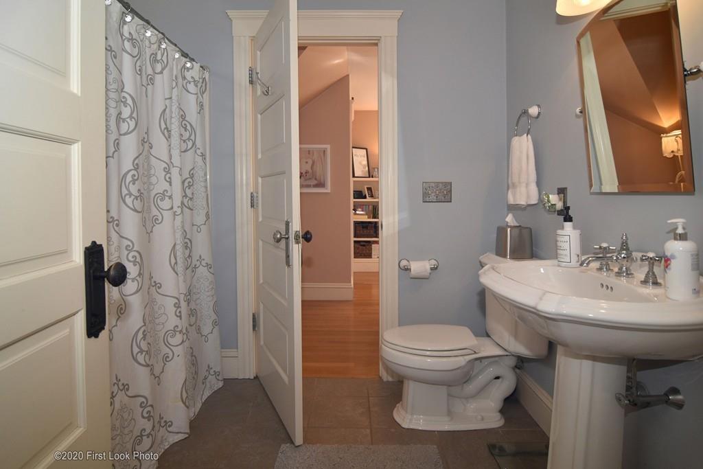 50 Cook Road Cumberland, RI 02864 - Photo 24 of 42 a bathroom with a sink toilet and shower