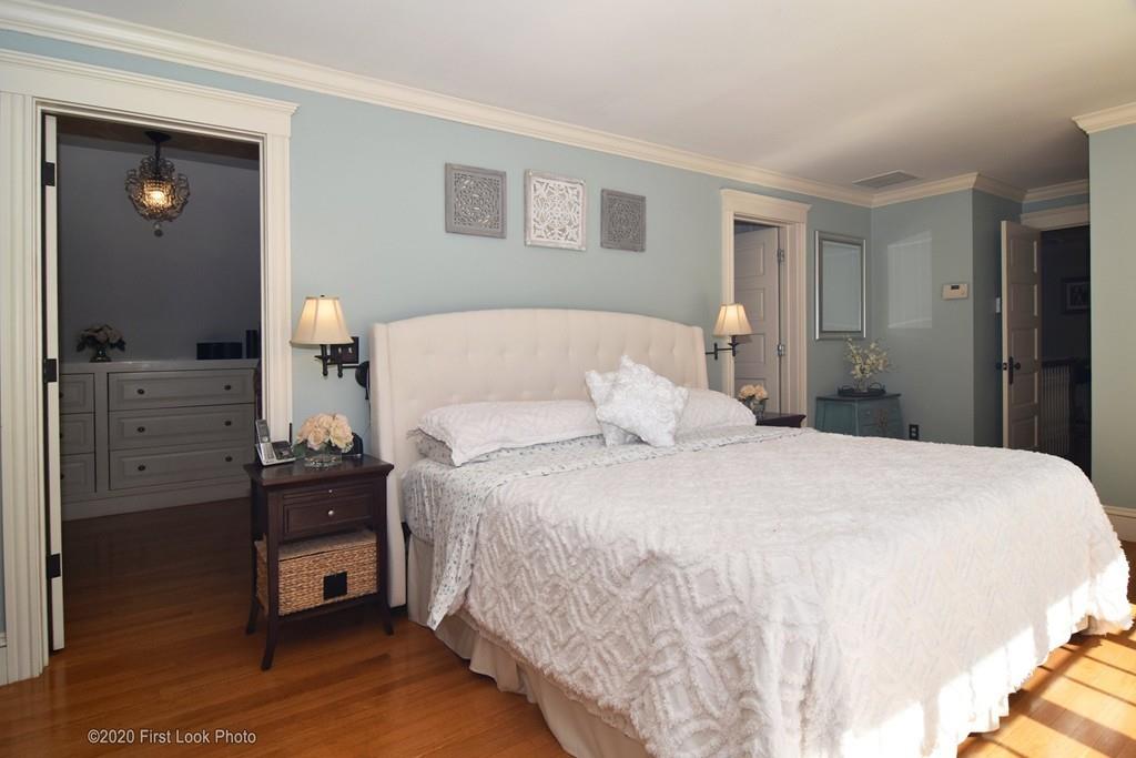 50 Cook Road Cumberland, RI 02864 - Photo 28 of 42 a bedroom with a bed and a dresser