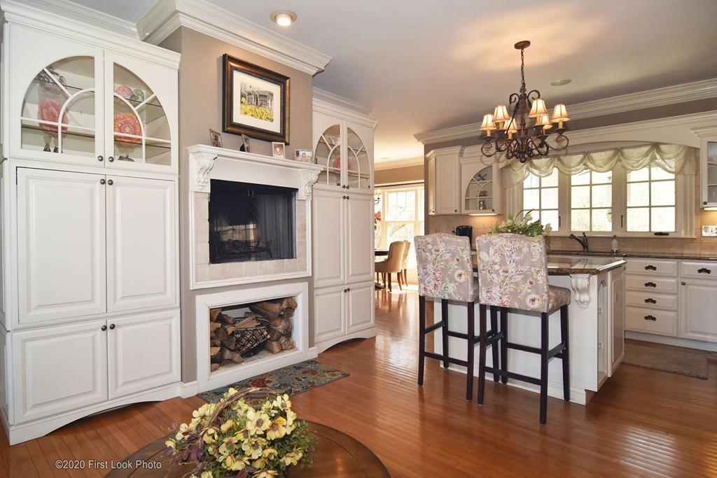 50 Cook Road Cumberland, RI 02864 - Photo 8 of 42 a view of a dining room with furniture and wooden floor