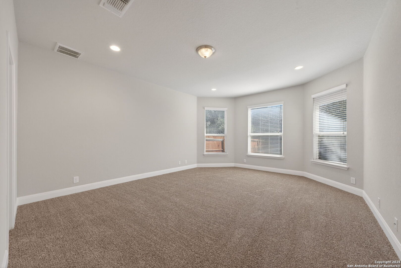 8326 Hydrangea Path Boerne, TX 78015 - Photo 18 of 39 a view of an empty room with a window