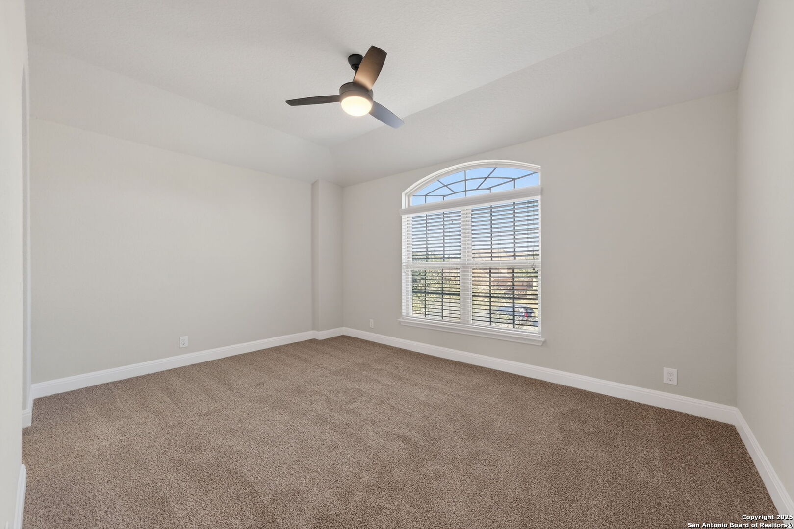 8326 Hydrangea Path Boerne, TX 78015 - Photo 29 of 39 a view of an empty room with a window