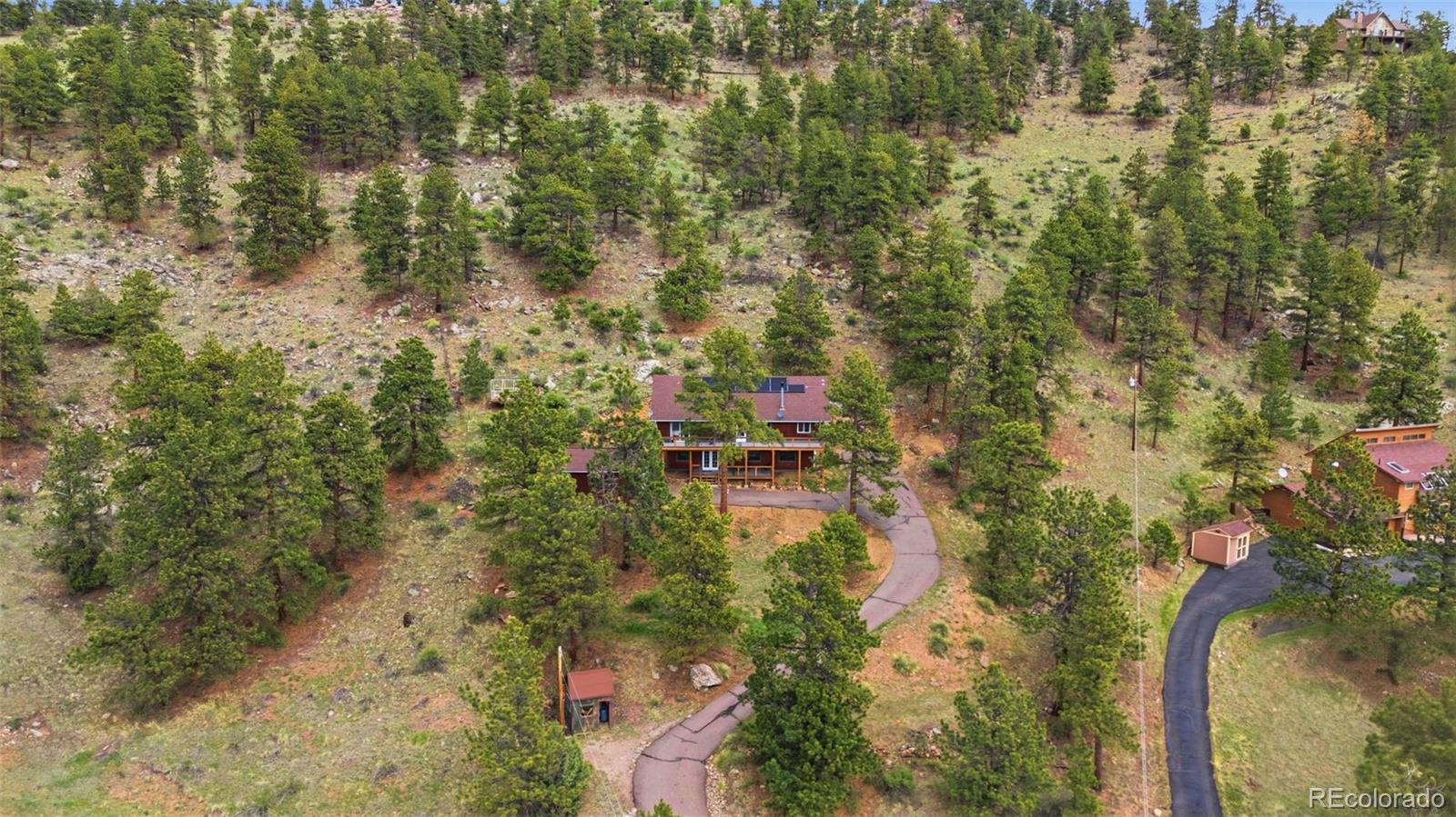 202 Badger Lane Bailey, CO 80421 - Photo 48 of 50 a aerial view of residential house with outdoor space and trees all around