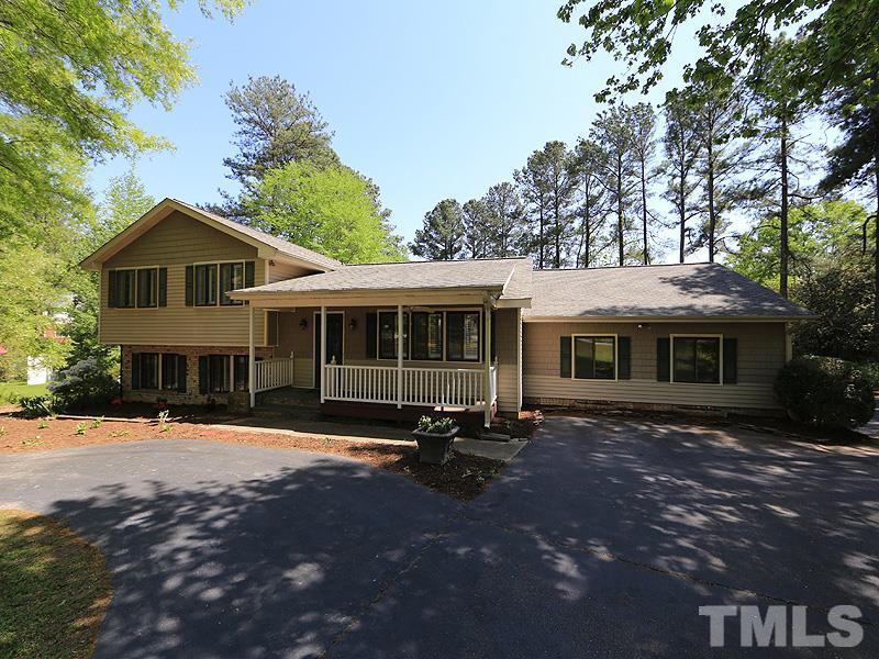 1504 Stratlen Court Raleigh, NC 27615 - Photo 1 of 17 a front view of a house with a yard