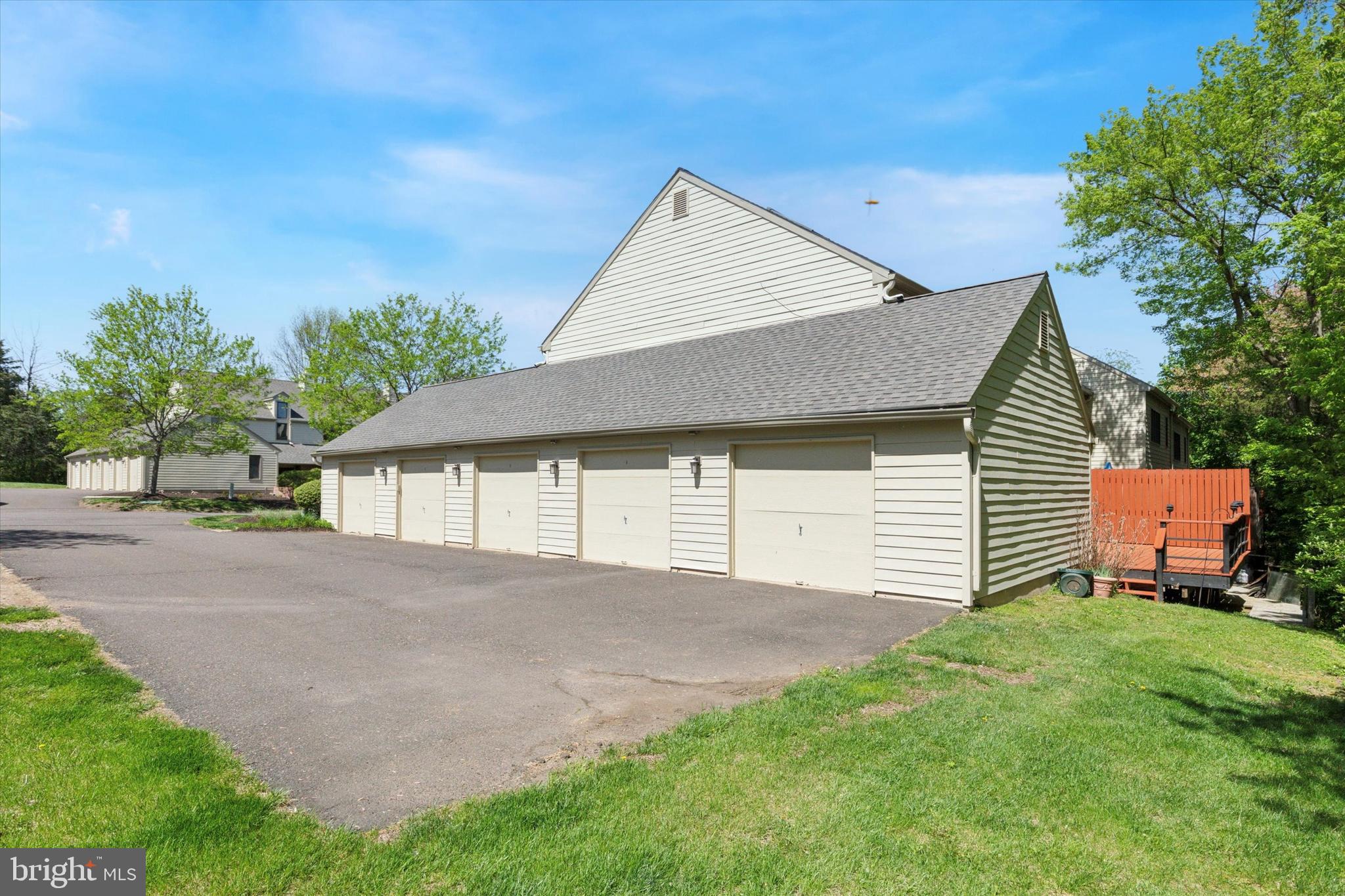 11 Ingham Way New Hope, PA 18938 - Photo 2 of 15 a front view of a house with a garden and garage