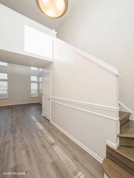 140 Crescent Lane Schaumburg, IL 60193 - Photo 2 of 21 a view of empty room with window and entryway