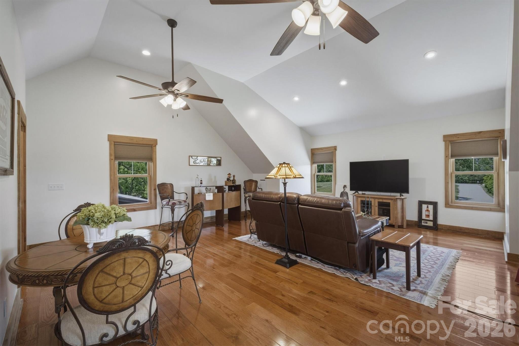 7490 Oak Ridge Church Road Connelly Springs, NC 28612 - Photo 30 of 44 a living room with furniture and a flat screen tv