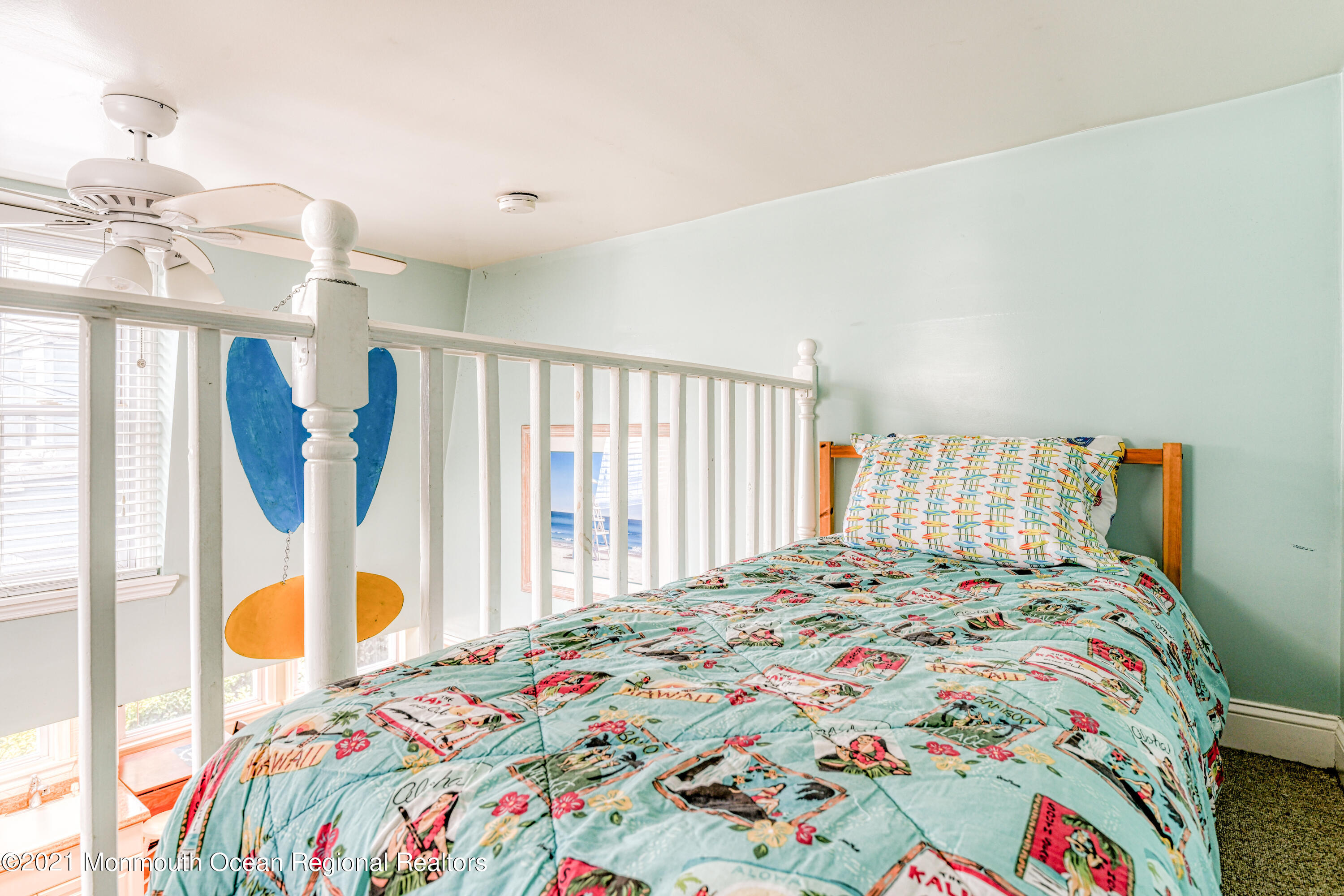 35 Ocean Pathway, Unit 4 Ocean Grove, NJ 07756 - Photo 11 of 15 a bedroom with a bed and a window