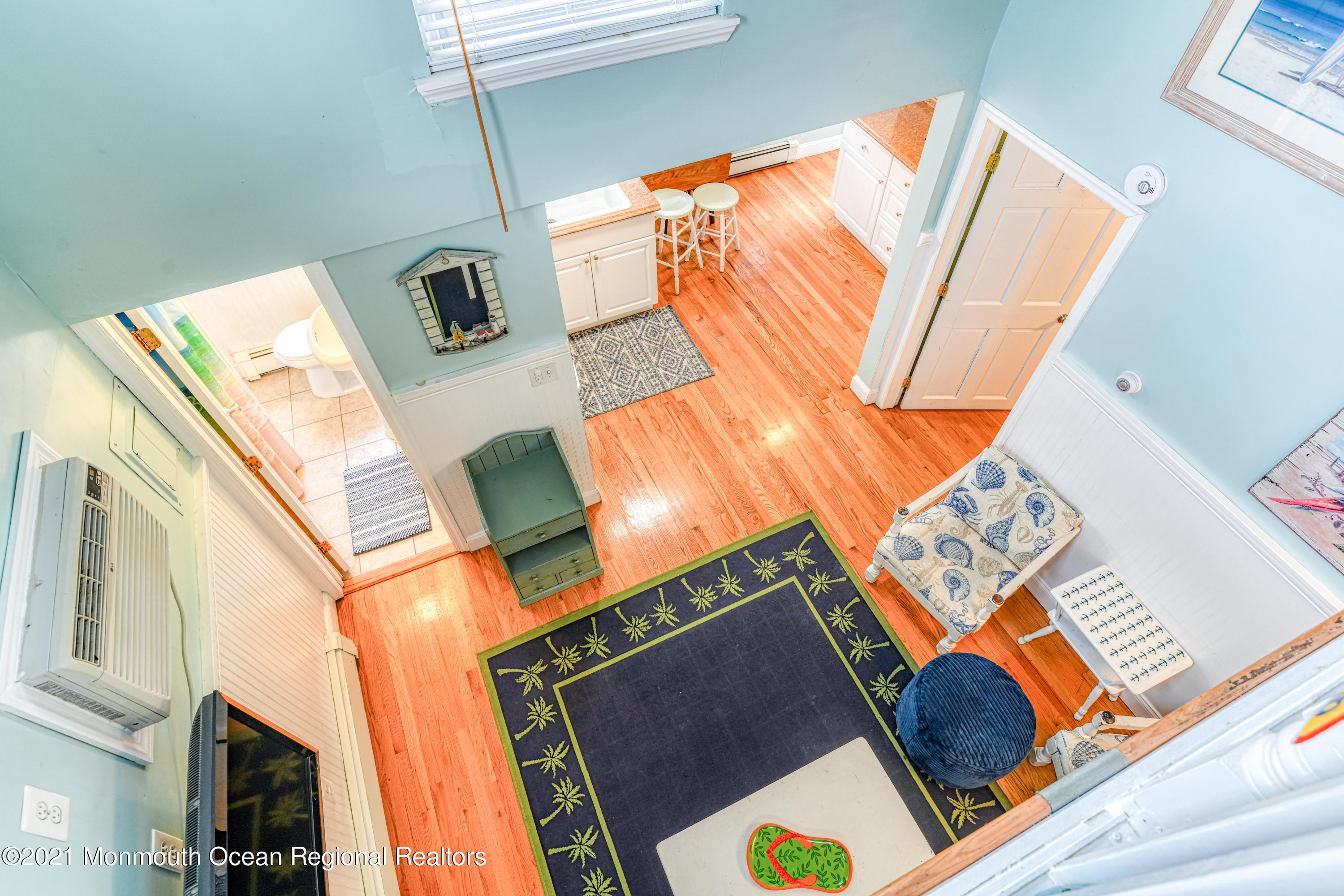 35 Ocean Pathway, Unit 4 Ocean Grove, NJ 07756 - Photo 7 of 15 a view of a house with backyard and wooden floor