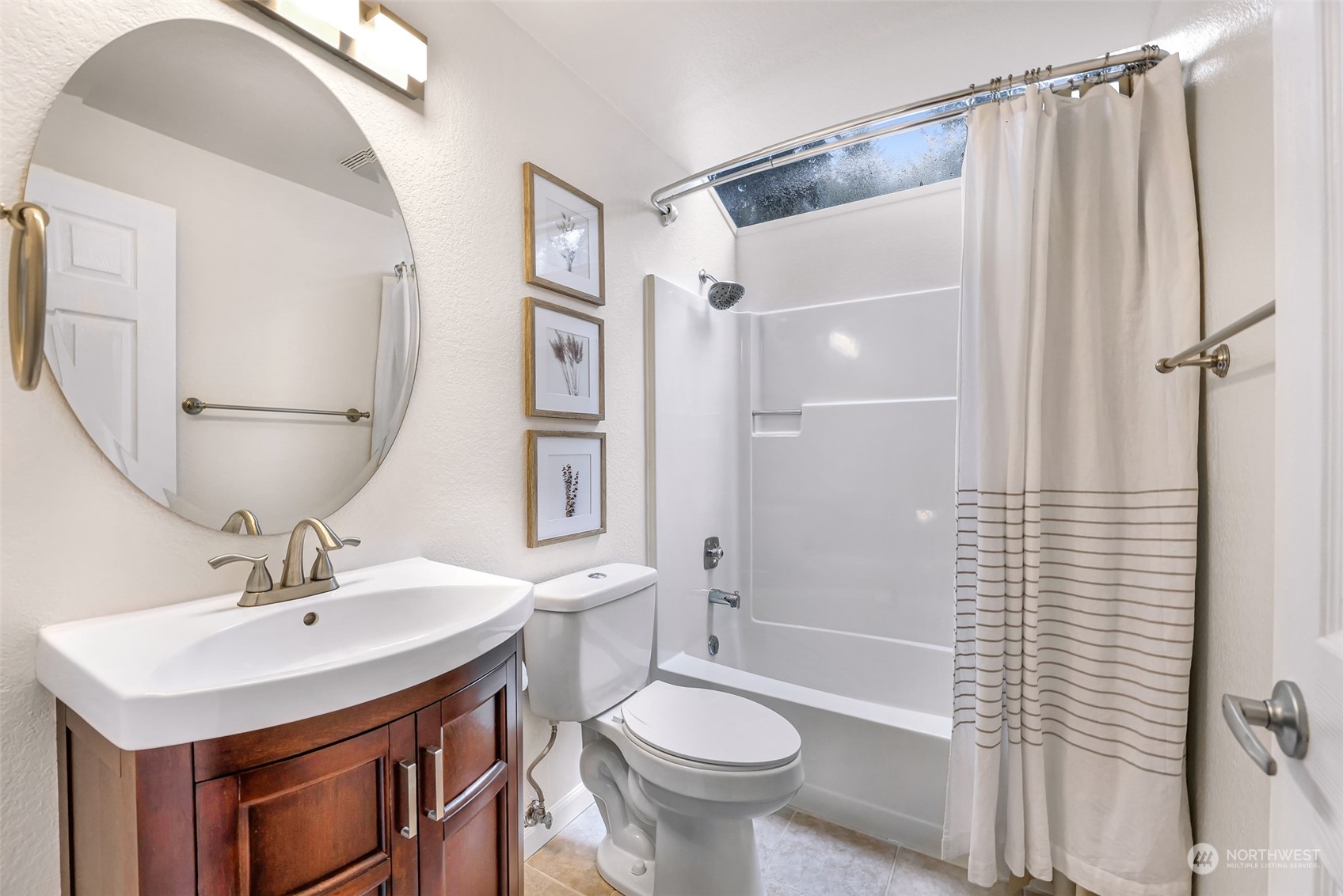 21923 4th Avenue Southeast Bothell, WA 98021 - Photo 18 of 25 a bathroom with a sink toilet and shower