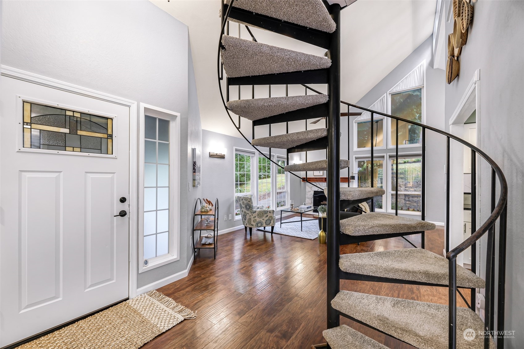 21923 4th Avenue Southeast Bothell, WA 98021 - Photo 3 of 25 a view of an entryway with wooden floor and door
