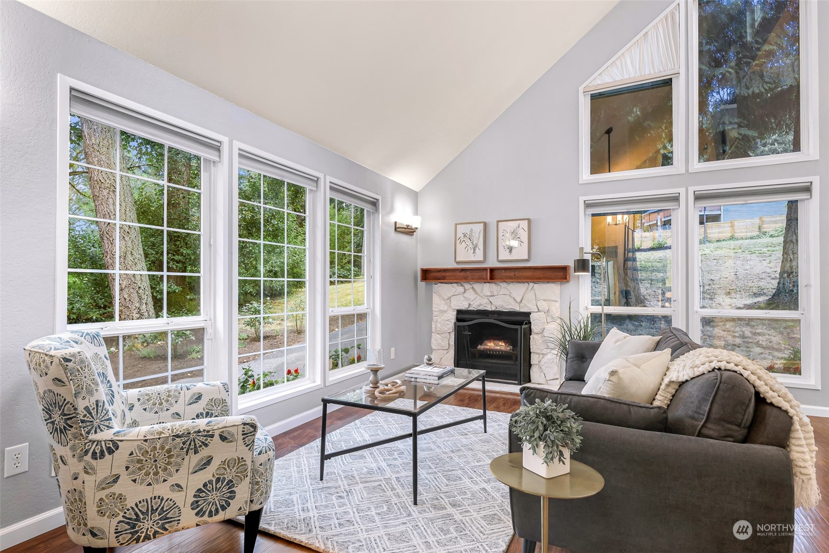 21923 4th Avenue Southeast Bothell, WA 98021 - Photo 5 of 25 a living room with furniture and a fireplace