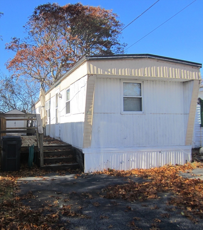 a view of a house with a roof deck